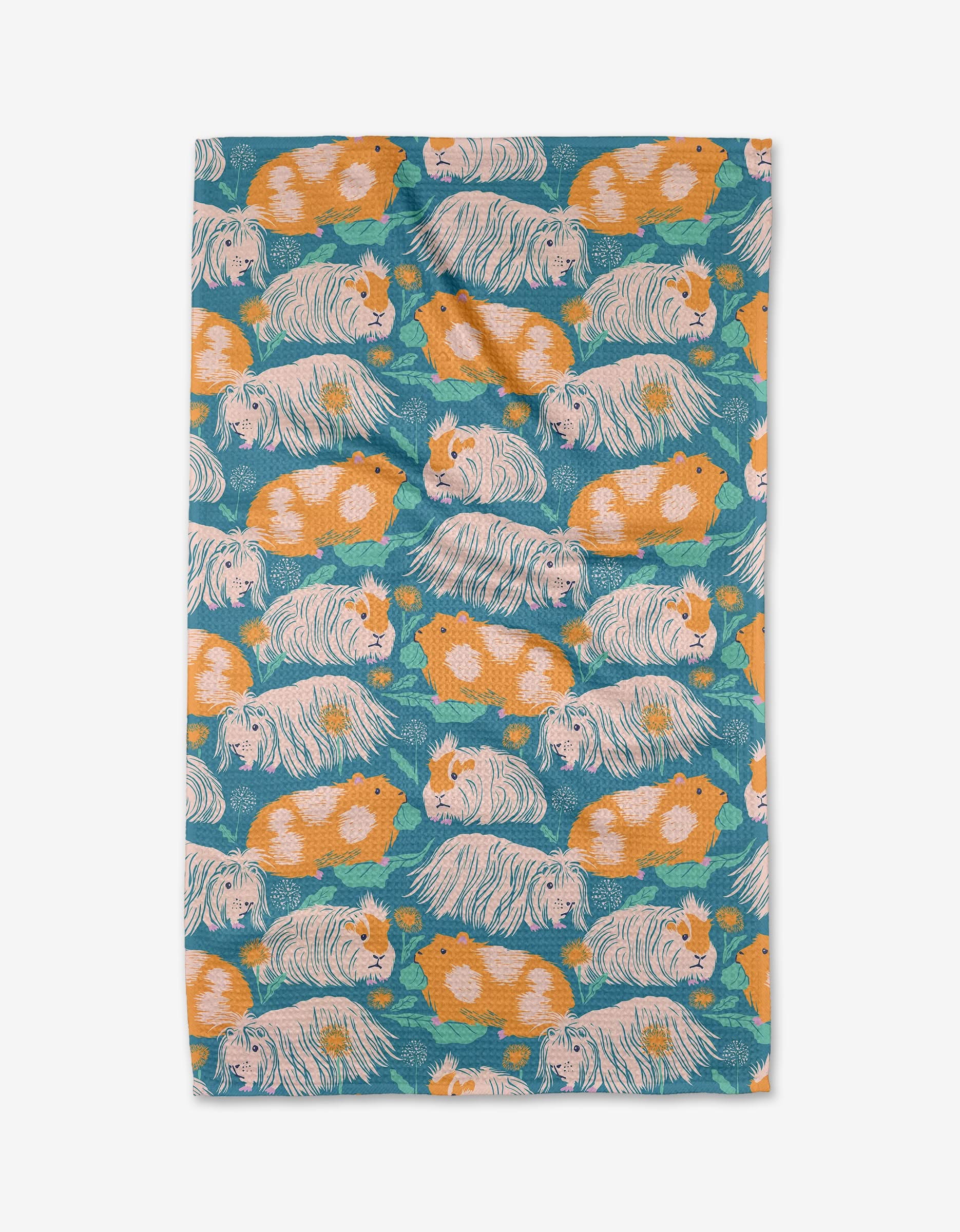 Peruvian Guineas by Elisabeth Wing features a Geoweave fabric with orange, white, and tan guinea pig patterns on teal with green accents, made from ultra-absorbent recycled materials.
