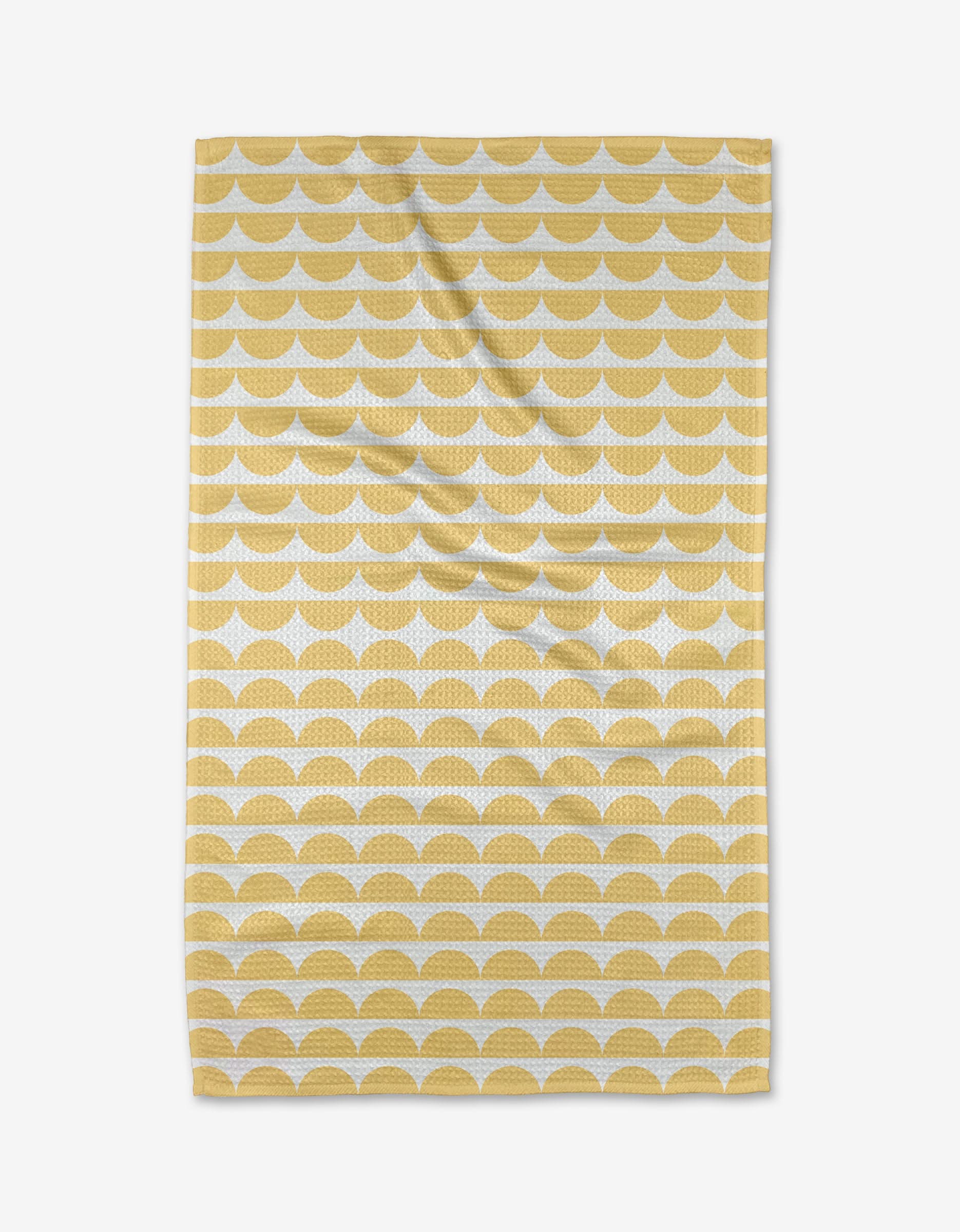 The Buy Guides Scallops - Yellow is a rectangular tea towel with yellow semi-circles in horizontal rows on white Geoweave™ fabric, shown flat with slight wrinkles.