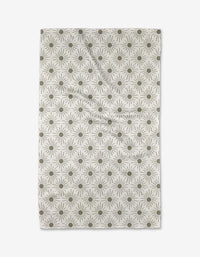 The Hufton Studio Sunny Geo is a rectangular beige cloth featuring evenly spaced olive green sunbursts. Made from ultra-absorbent Geoweave fabric, it has a slightly wrinkled appearance.