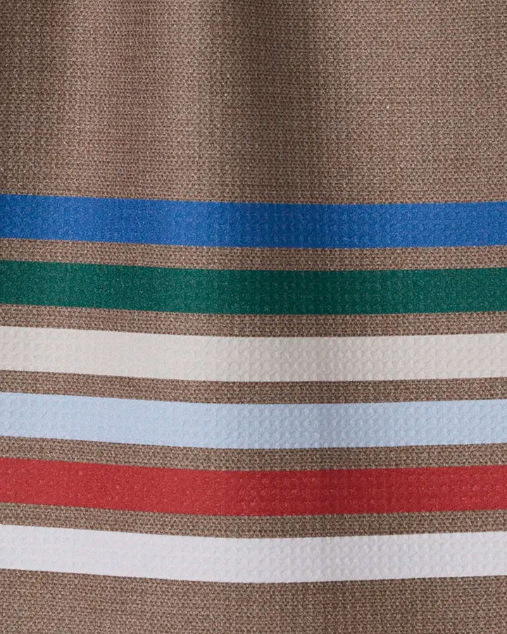 The Geometry Yuletide Band features a textured brown surface with blue, green, white, light blue, and red stripes—perfect as an absorbent dish towel for your kitchen.