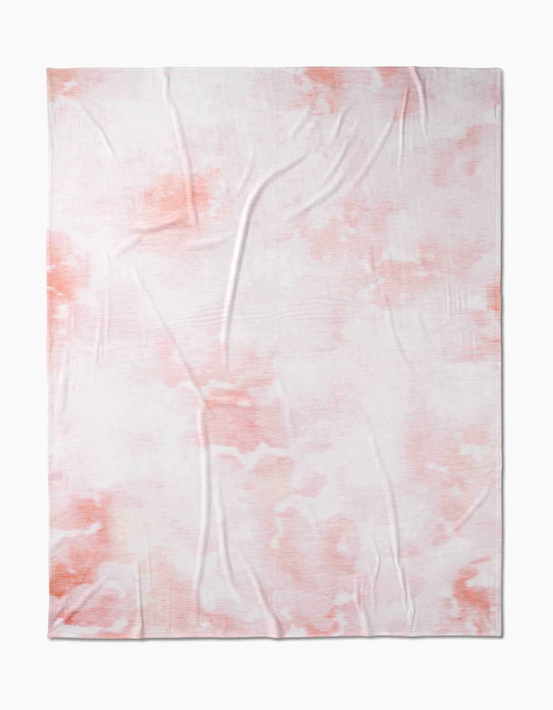 The Geometry In the Clouds Butter Blanket is a soft, rectangular throw with a subtle pink and white tie-dye pattern, designed for silky softness and gentle comfort.