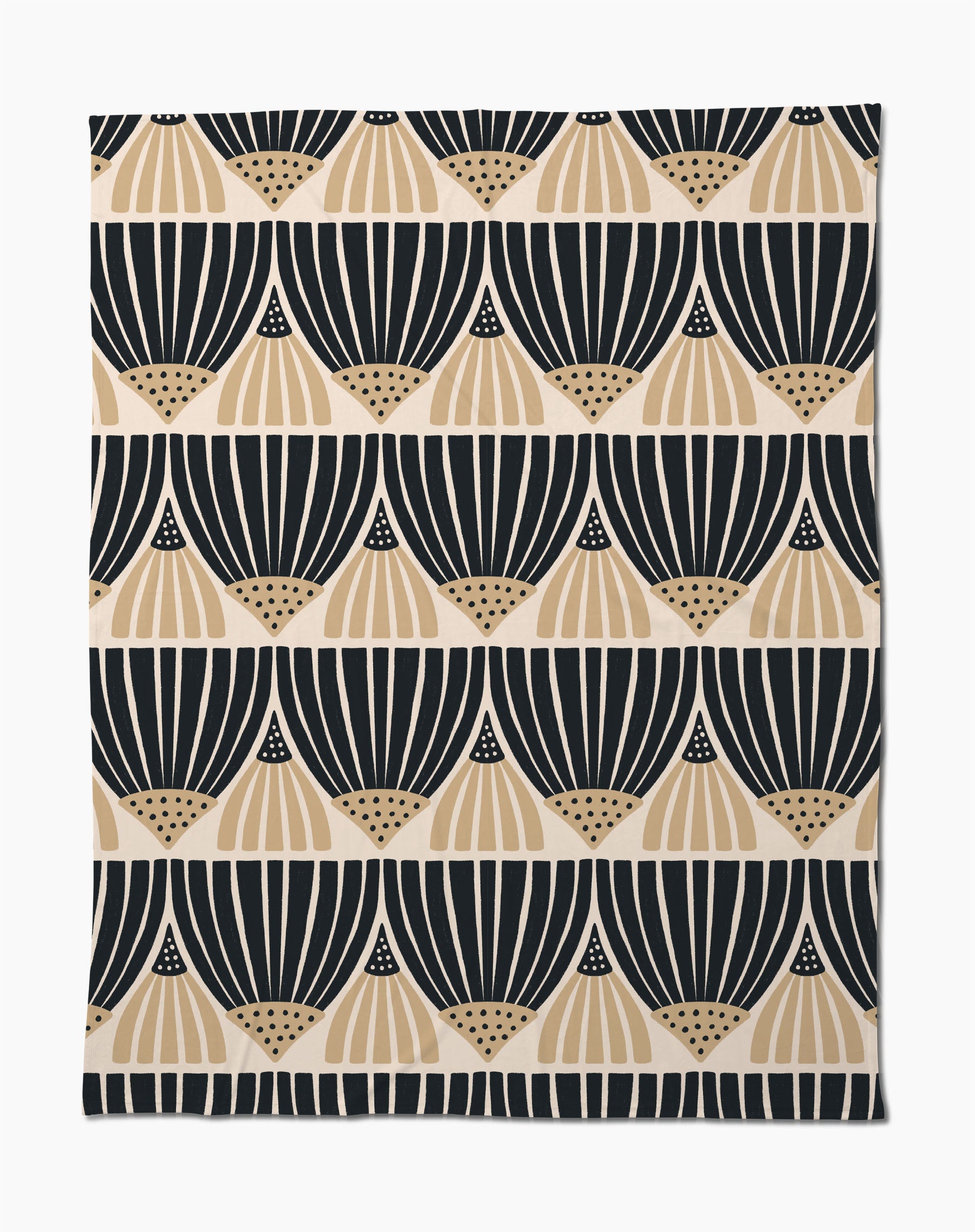 The Letitia Dark Butter Blanket by Amy MacCready features black and tan geometric fan patterns on white, arranged in horizontal rows. Made from eco-friendly recycled materials, it offers a modern, minimalist style.