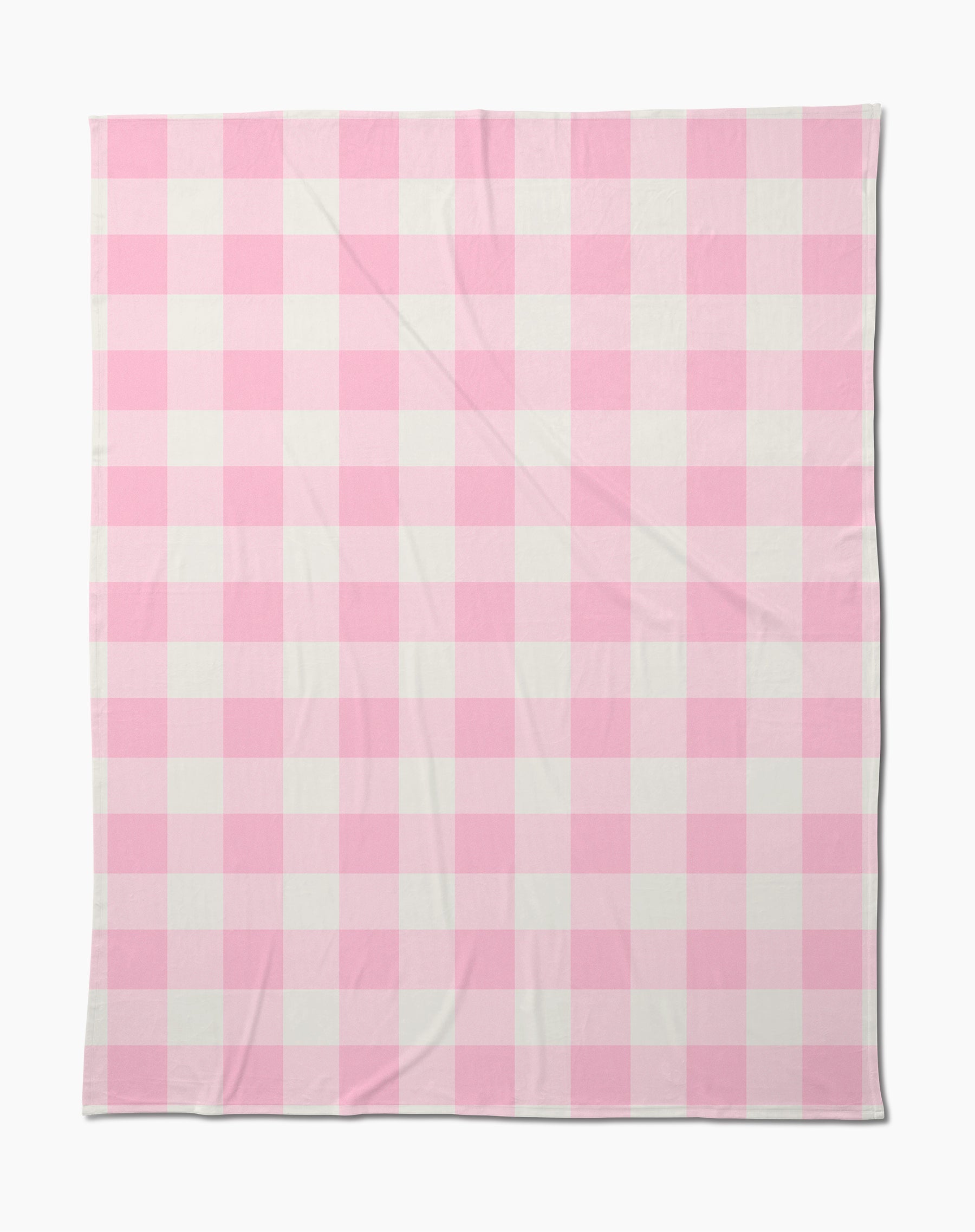The Geometry Val Butter Blanket showcases a pink and white gingham checkered pattern, laid flat against a white background.