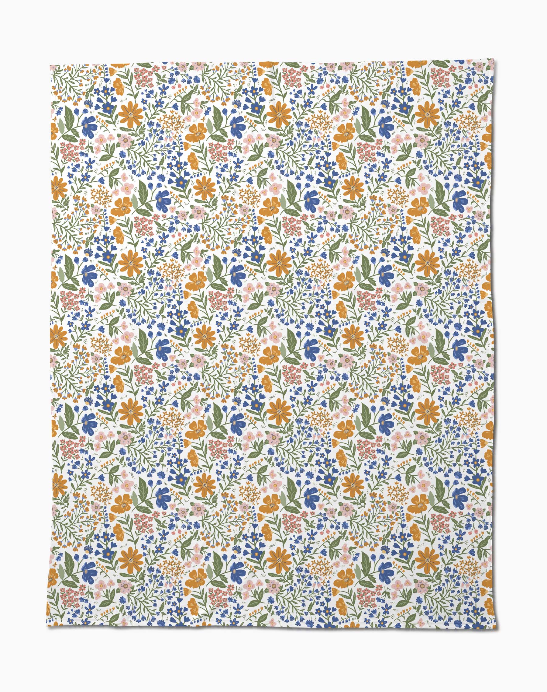 Wildflower Vine Blush by Danelys Sidron is a silky soft fabric with a vibrant floral pattern of small orange, blue, pink, and yellow flowers and green leaves densely scattered on a white background.