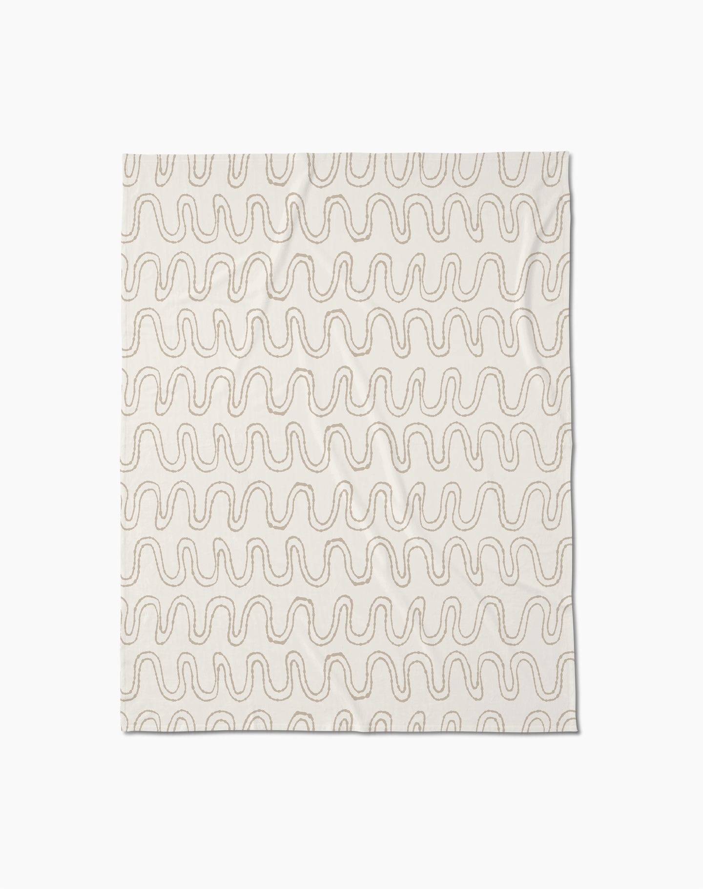 The Abstract Squiggles throw blanket by Geometry is crafted from recycled blankets for comfort and sustainability, featuring a soft cream color with evenly spaced wavy beige lines in a repeating pattern, displayed flat against a white background.