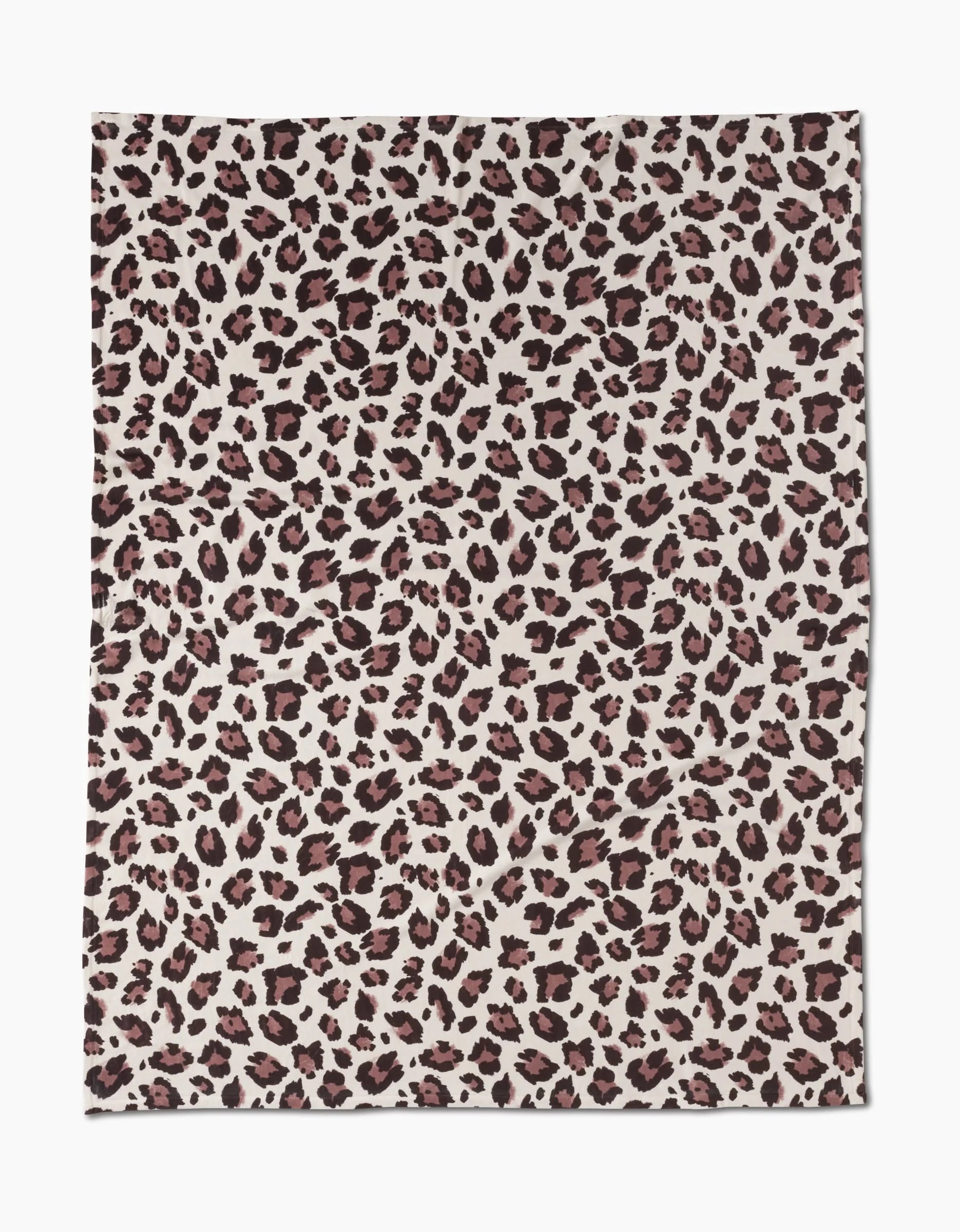 The Geometry Cheetah is a rectangular fabric with a leopard print featuring dark brown and black spots on light beige, offering silky softness for cozy comfort.