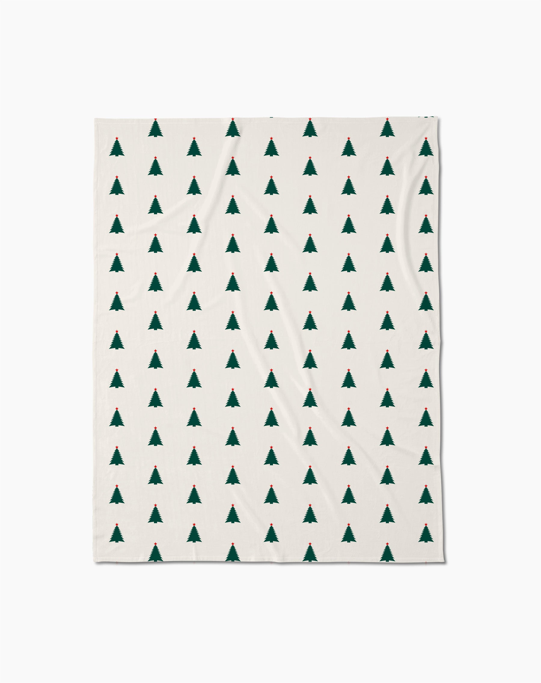 The Cozy Christmas Butter Blanket by Geometry features a cream base with rows of small green pine trees, blending comfort and festive charm in any space.