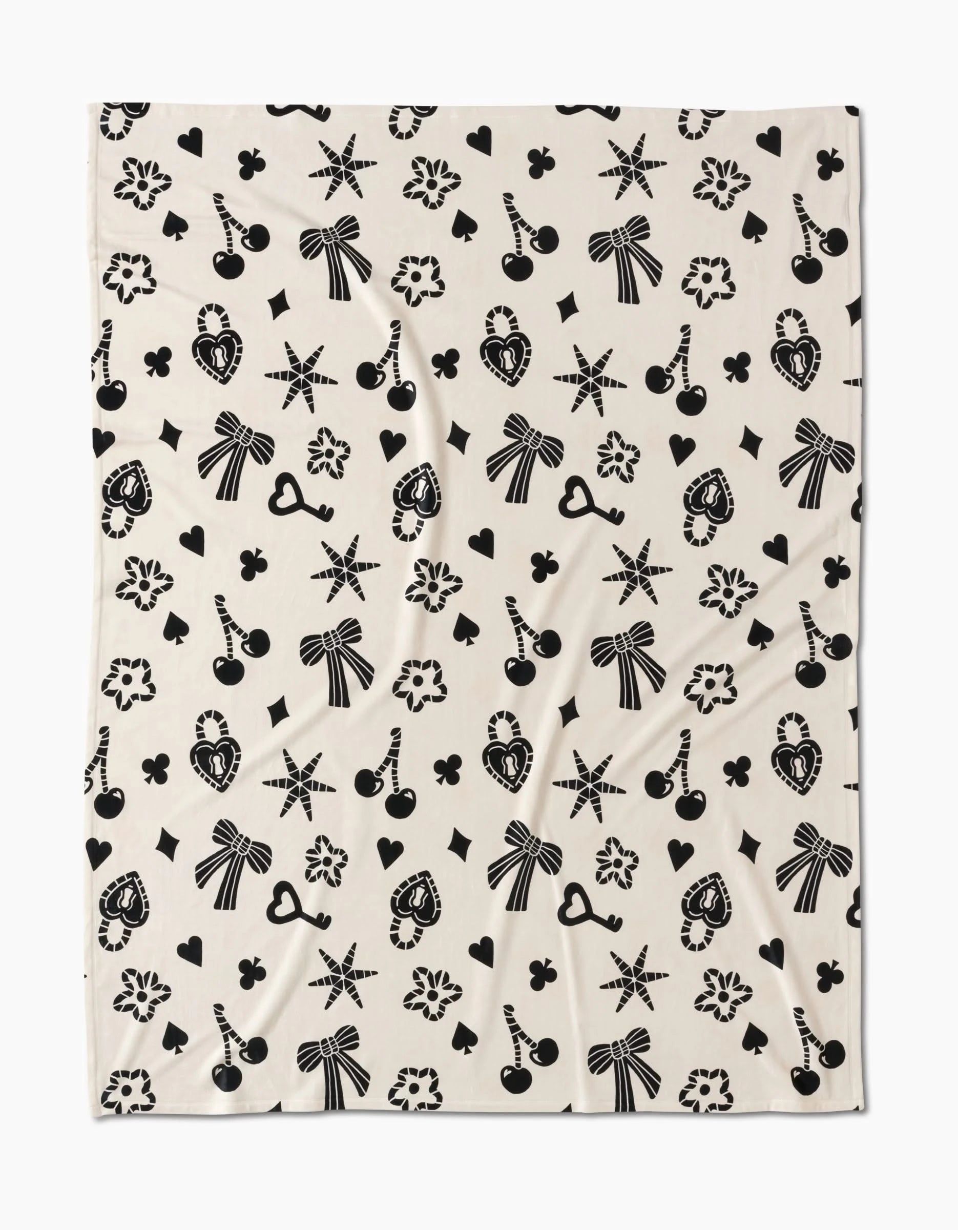 The Heart Locket by Geometry features a playful cream design with black bows, cherries, and hearts—crafted from recycled materials for silky-soft comfort youll love to snuggle into.