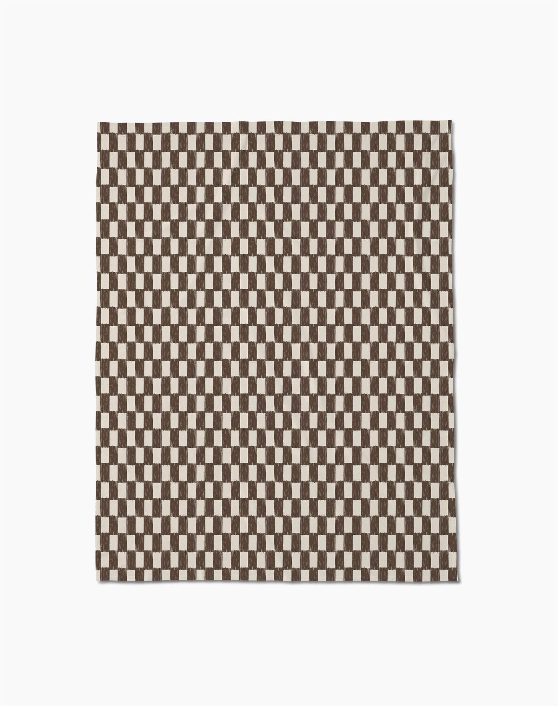 The Geometry Hot Coa Coa is a rectangular recycled throw blanket featuring a dense brown and white checkerboard pattern—perfect as a soft, eco-friendly accent for your space.
