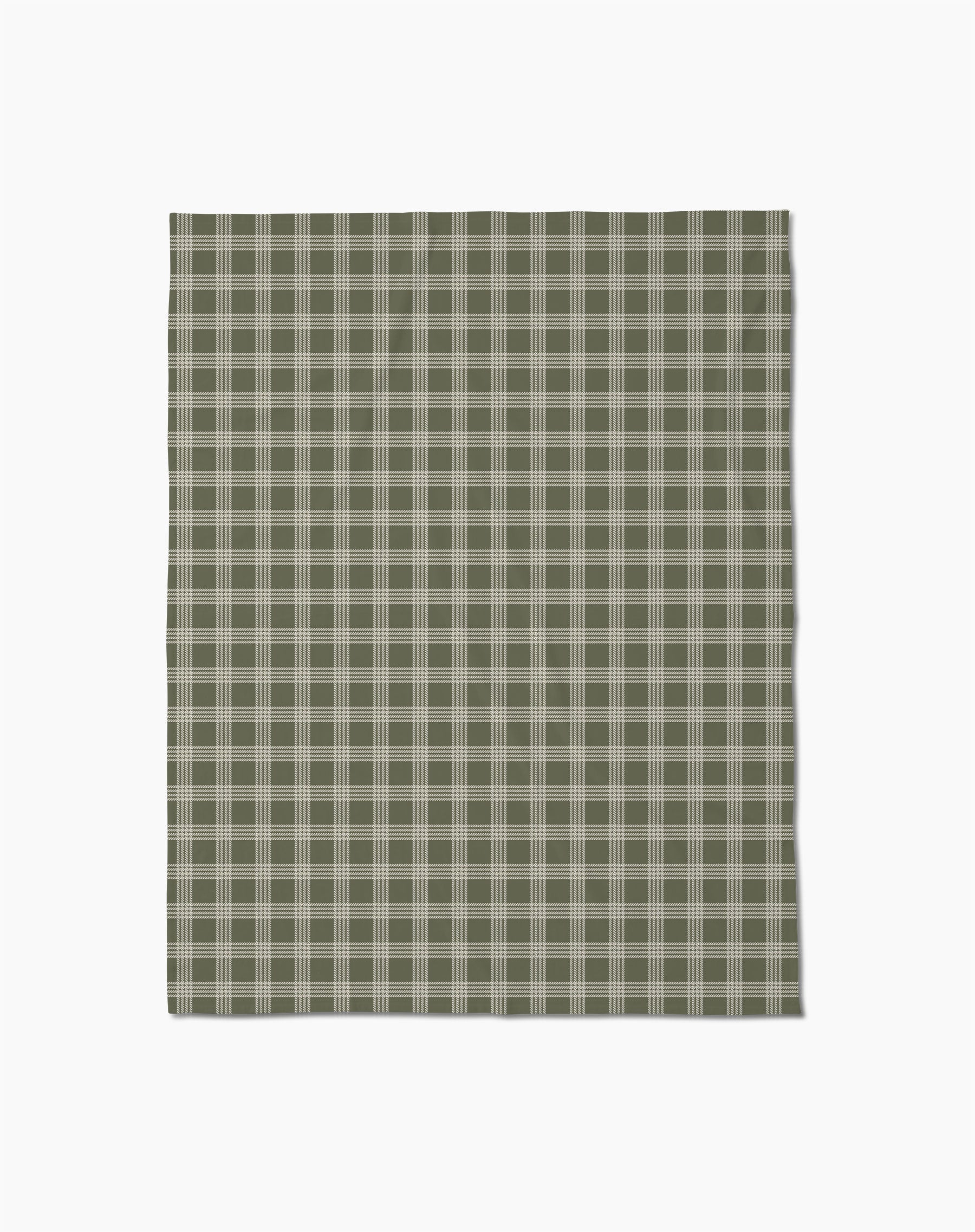 The Juniper by Geometry features an olive green and white plaid pattern with evenly spaced lines on a crisp white background—perfect for a cozy throw blanket that brings classic, stylish comfort to any space.
