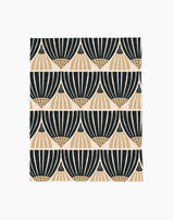Letitia Dark by Amy MacCready features a repeating geometric pattern with black and beige fan-shaped designs on white in horizontal rows. Made from eco-friendly materials, it beautifully blends style with sustainability.