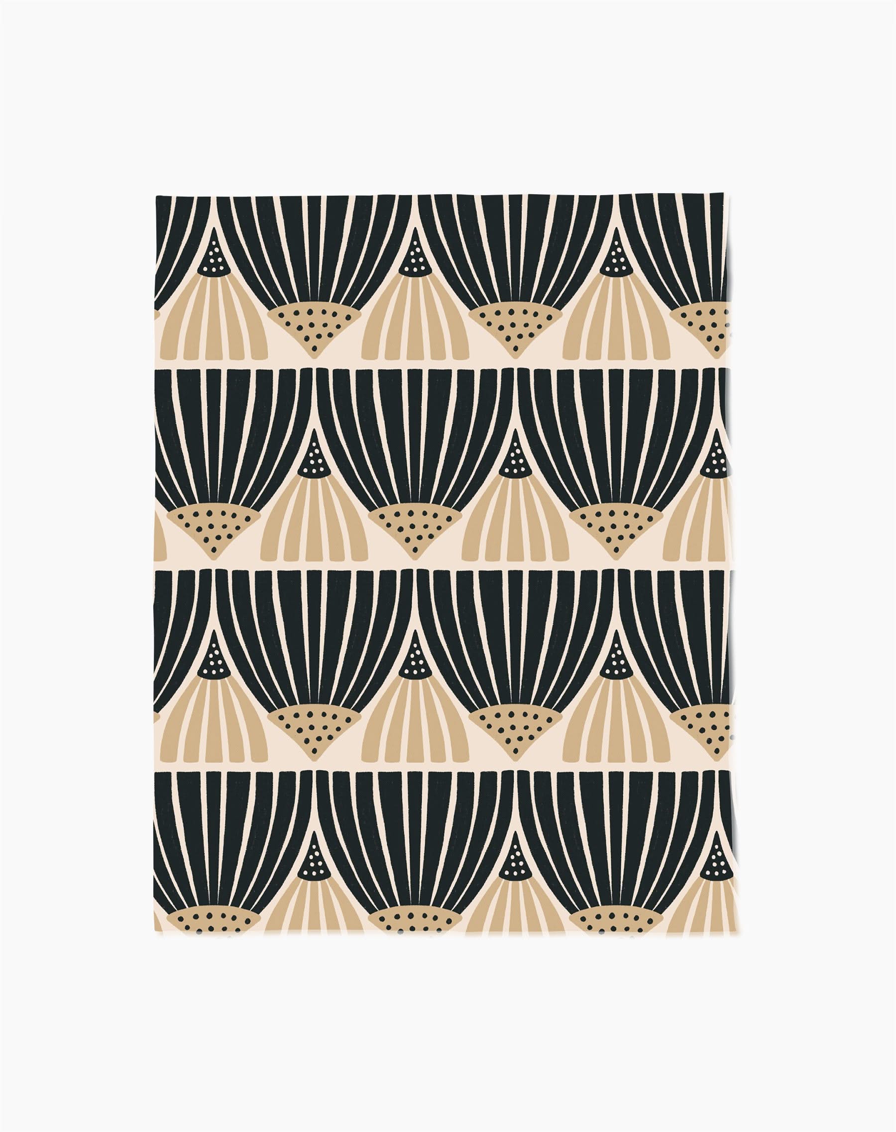 Letitia Dark by Amy MacCready features a repeating geometric pattern with black and beige fan-shaped designs on white in horizontal rows. Made from eco-friendly materials, it beautifully blends style with sustainability.