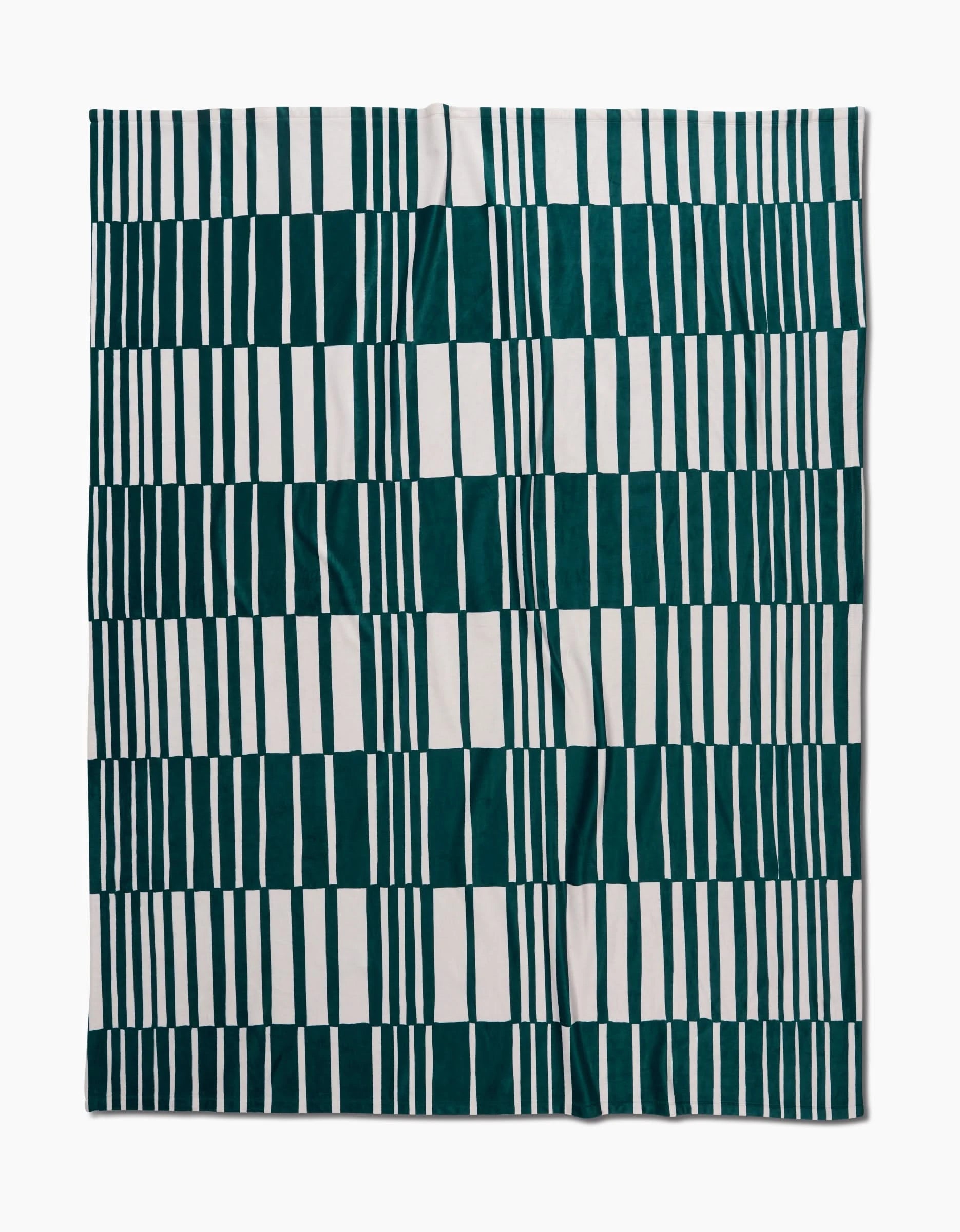 The Verdelia by Geometry is a square textile with a geometric pattern of vertical green and white rectangles in rows, forming a checkered look. Made from recycled materials, it appears slightly wrinkled and is shown flat on a white background.