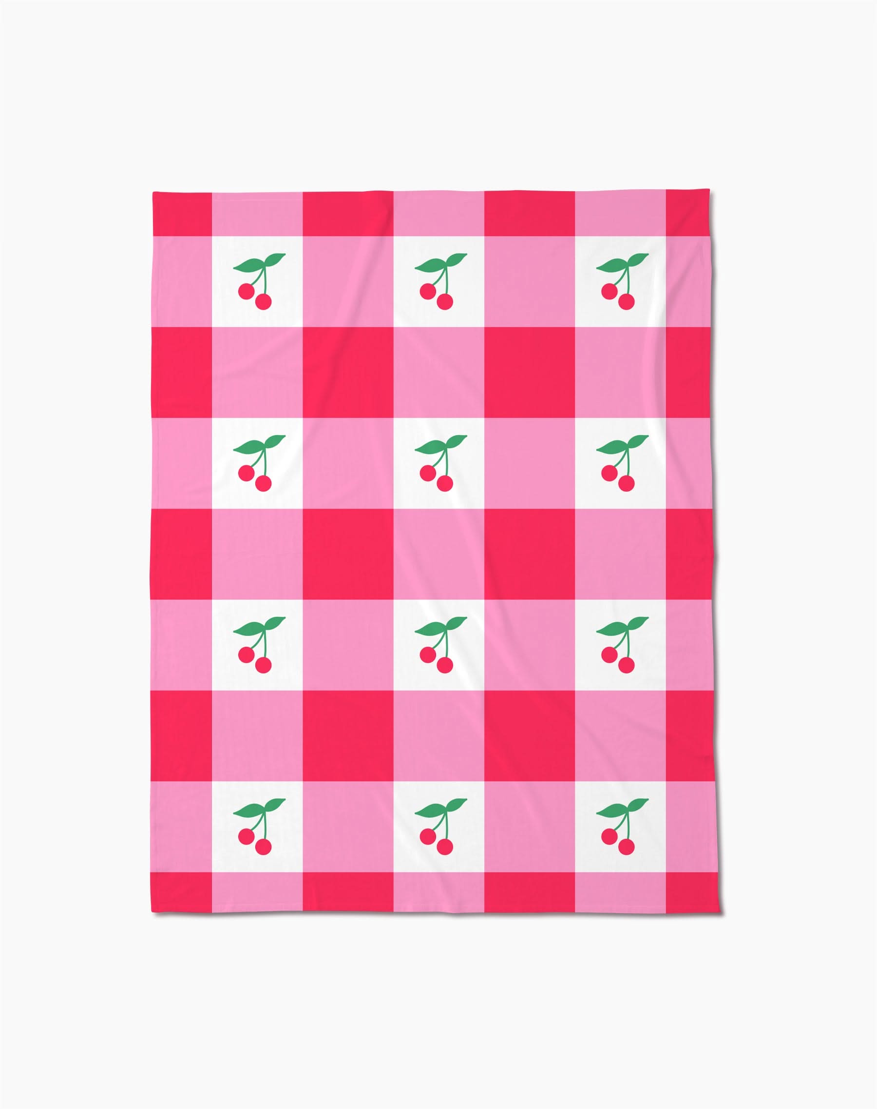 The Geometry Sweet Cherry Gingham throw blanket features a pink and red checkered pattern with white squares, each adorned with two red cherries and green leaves—adding cozy, cheerful comfort to any space.