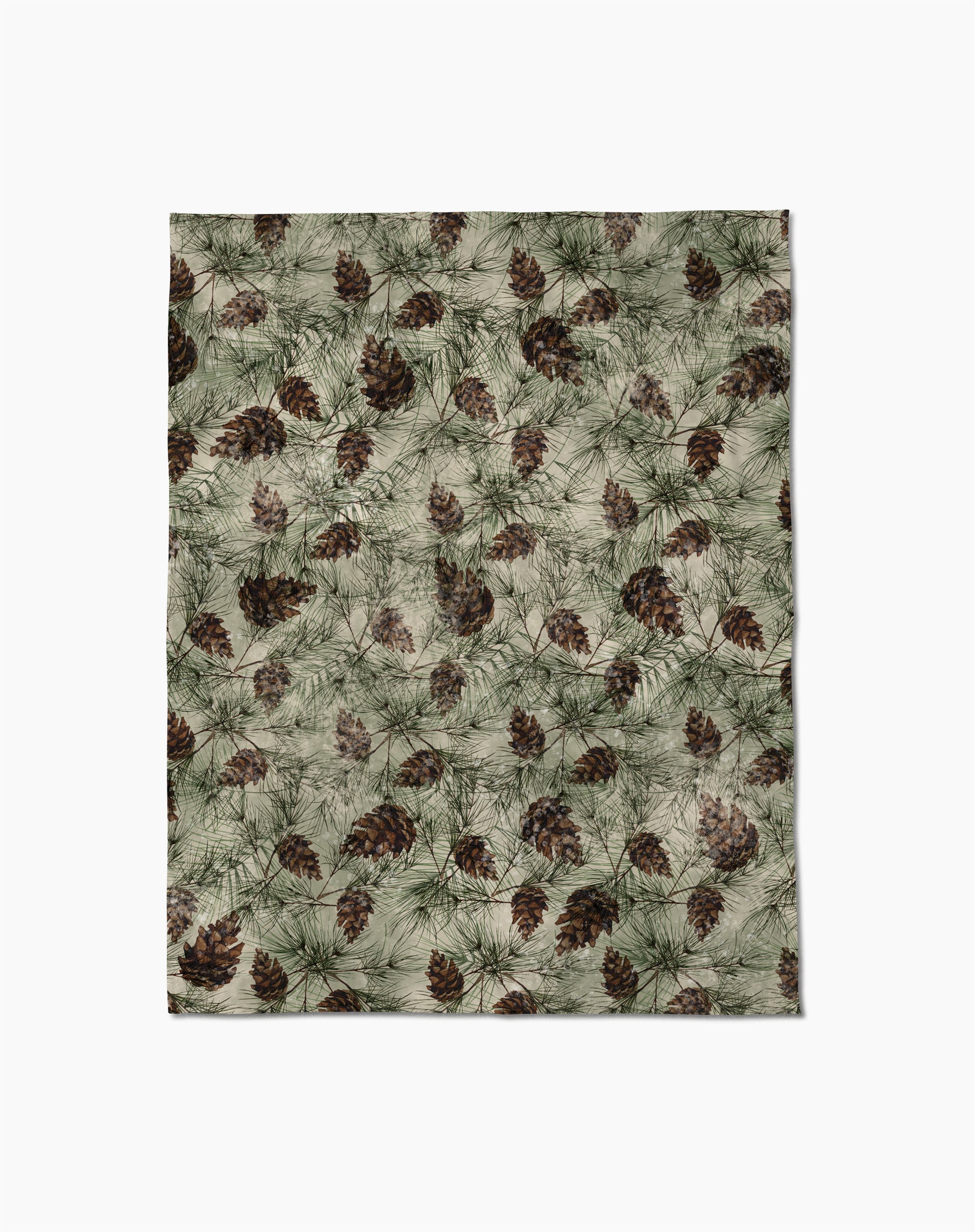 The Geometry Winter Pine Camo Butter Blanket features a nature-inspired print with pinecones and pine needles in green and brown on a light background, crafted from soft, silky fabric for cozy comfort.