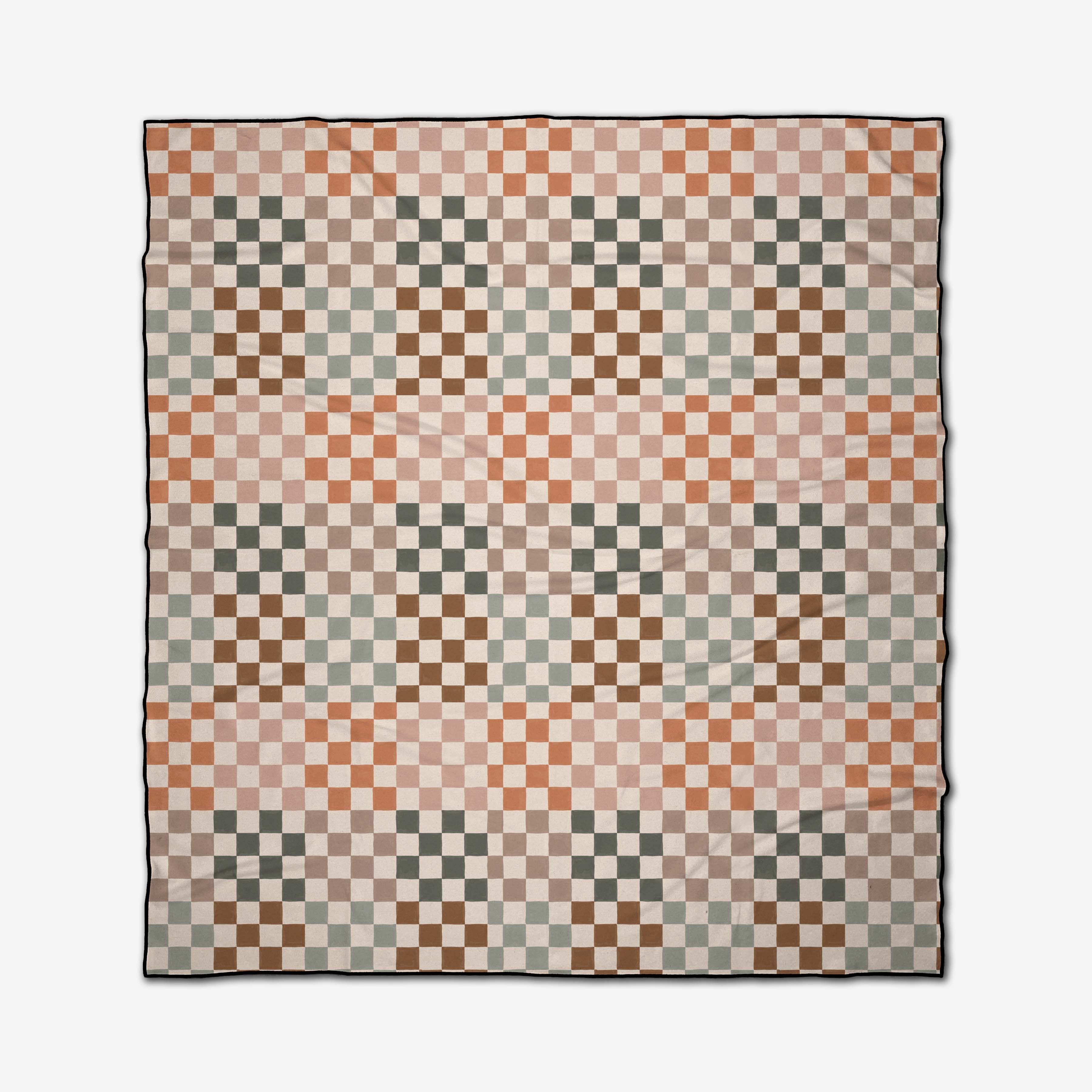 The Autumn Checkers quilt by GEOMETRY features a checkerboard pattern of cream, brown, orange, and green squares arranged in diagonal waves, inspired by the Micro-loop Beach Blanket.
