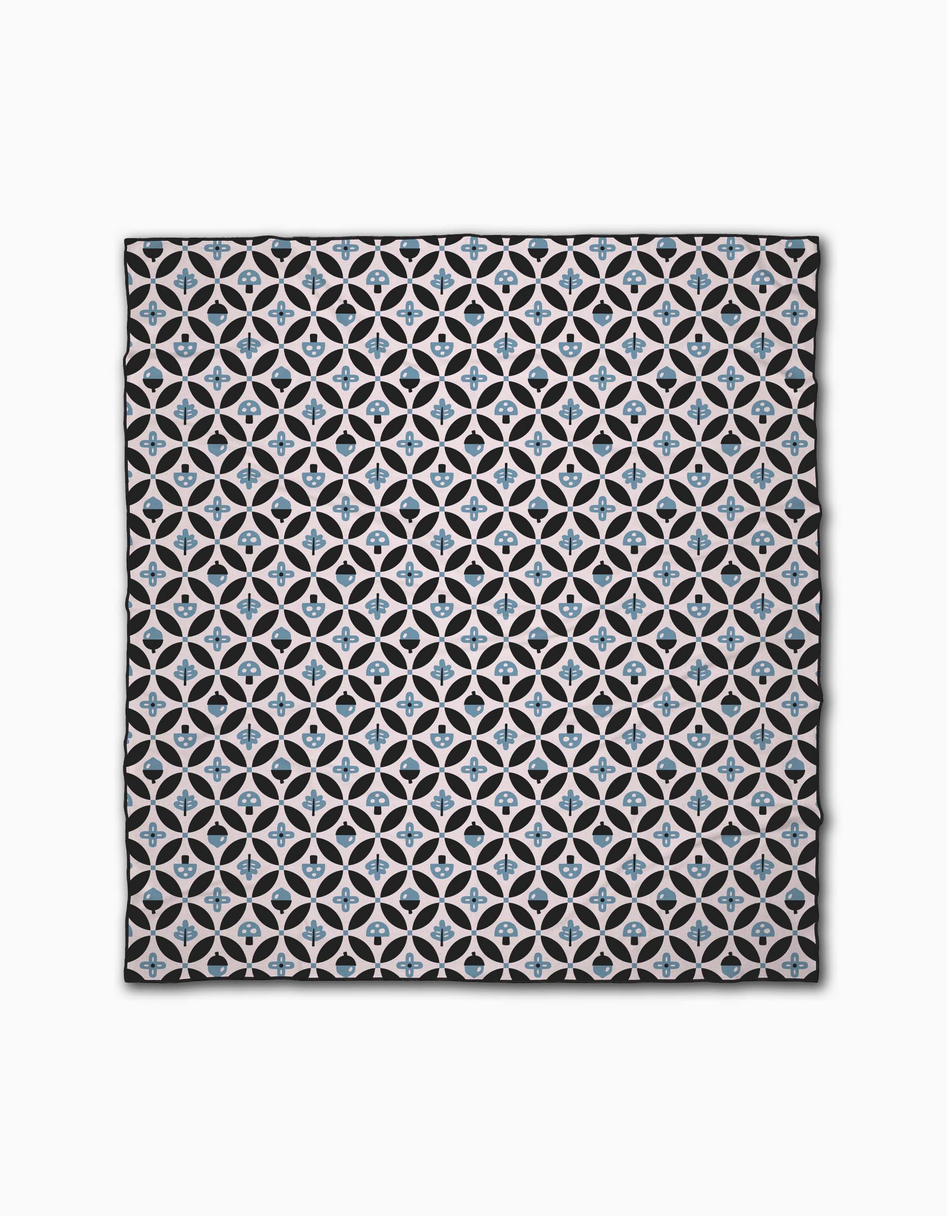 The Forest Findings Beach Blanket by Anette Heiberg is rectangular and features a repeating geometric pattern of white intersecting circles with blue and beige star shapes at the center, all set against a black background.