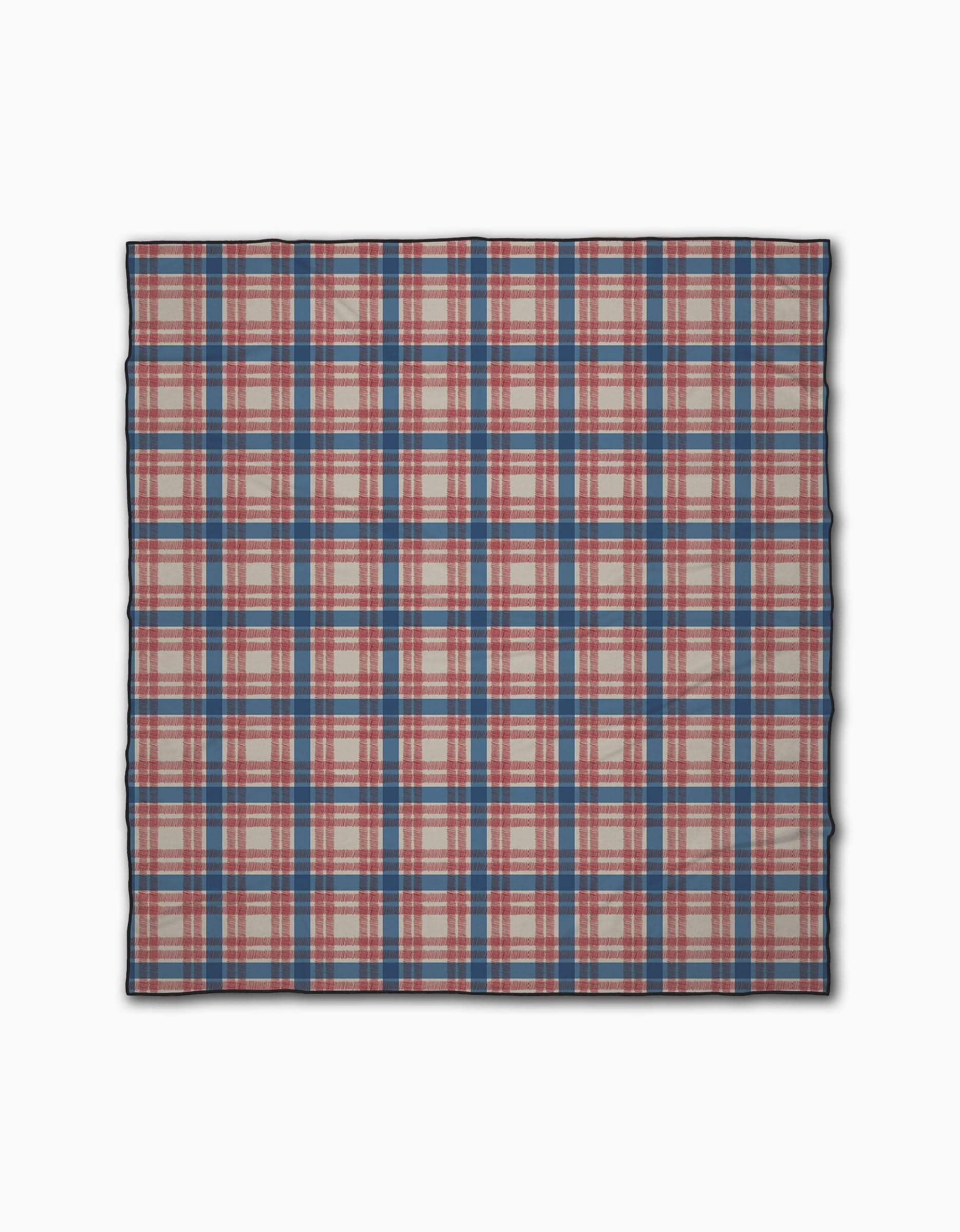 The Geometry Patriot Plaid is a rectangular beach blanket featuring a red, blue, and white plaid pattern on white, made from quick-drying recycled materials.