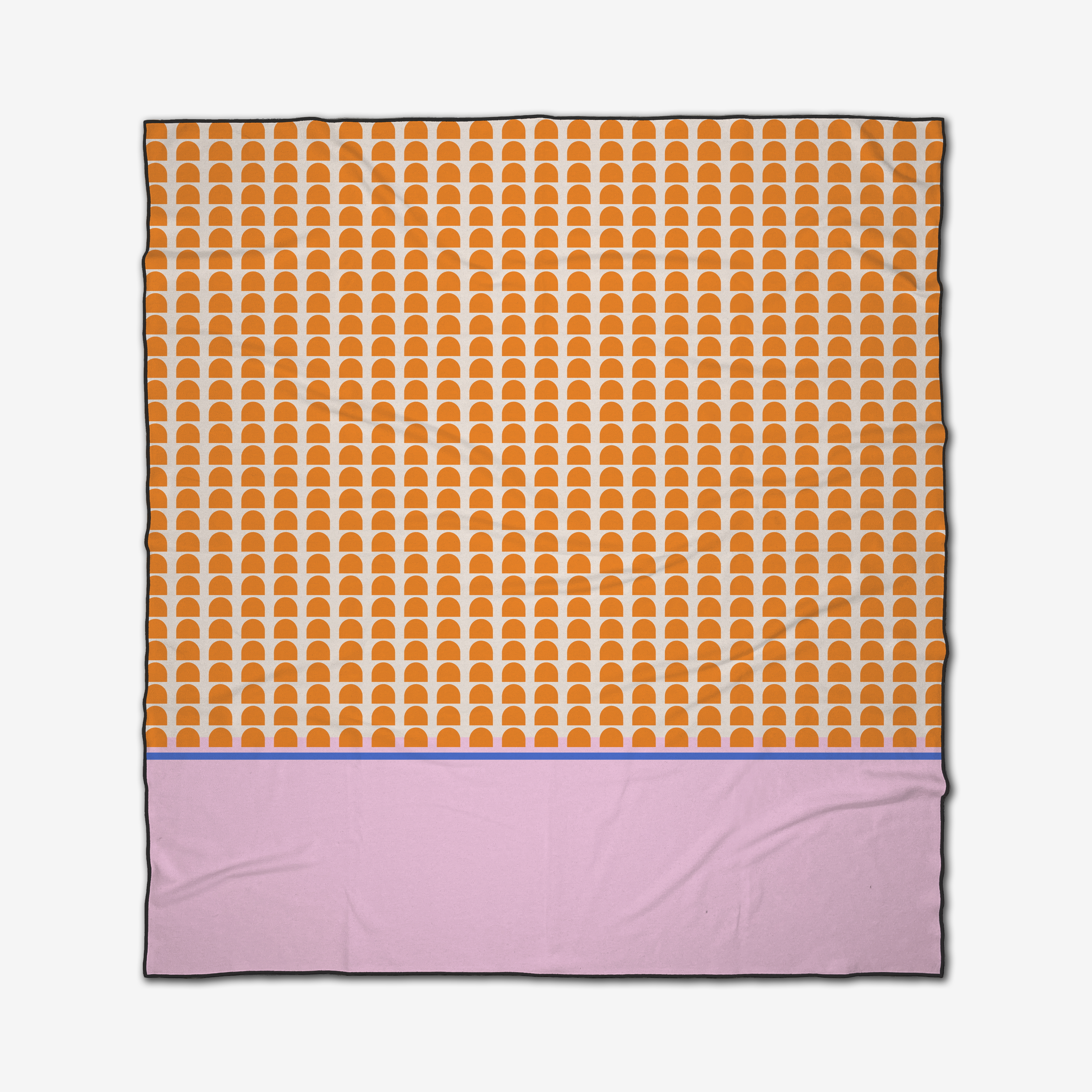 The Pink Illusion beach blanket by Happy Hemera is quick-drying, showcasing orange semicircles on a light beige background with a solid pink bottom bordered by a thin blue line.