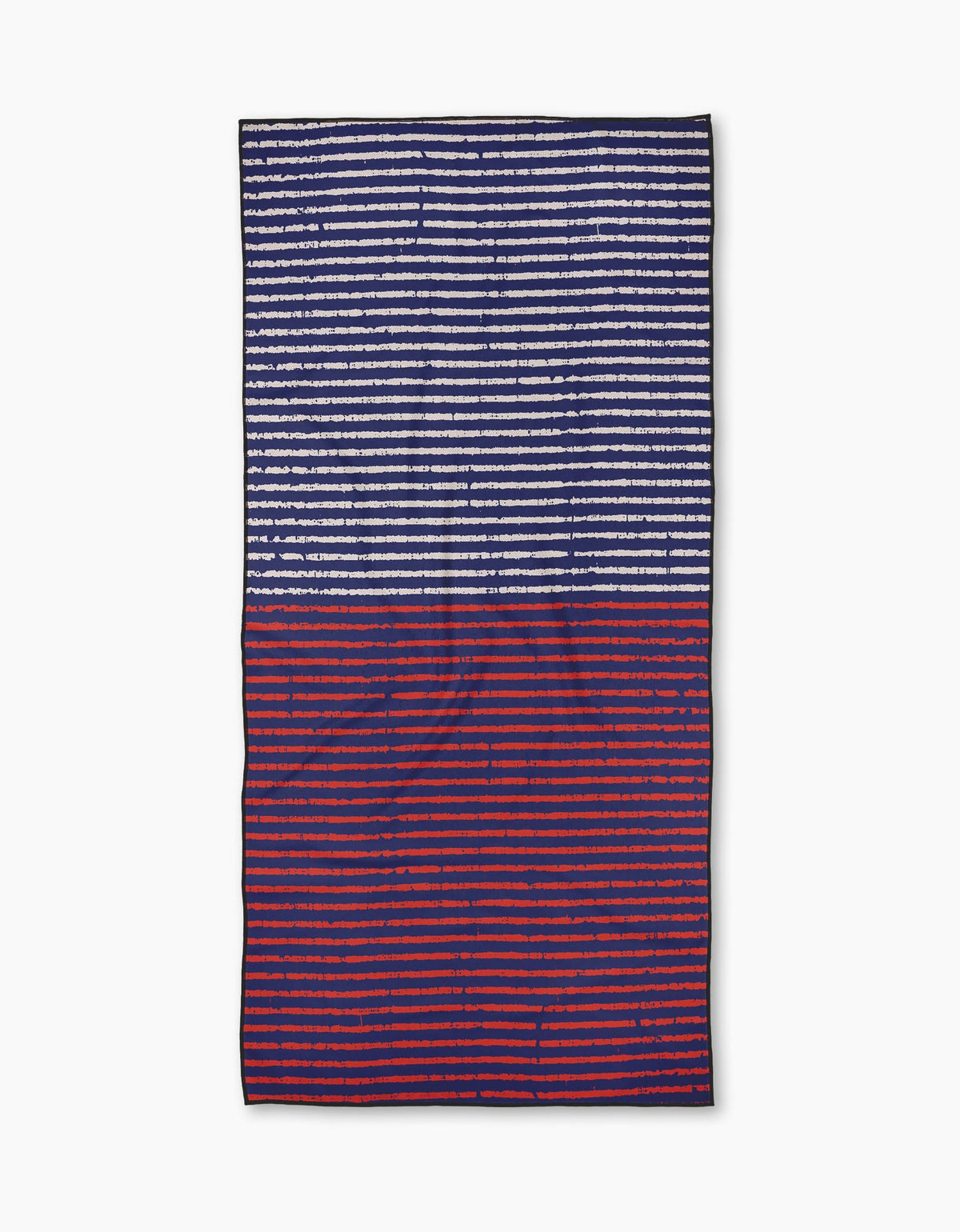 The Geometry Annapolis is a quick-drying beach towel with horizontal stripes: the top half displays white on navy, and the bottom half shows blue on red.