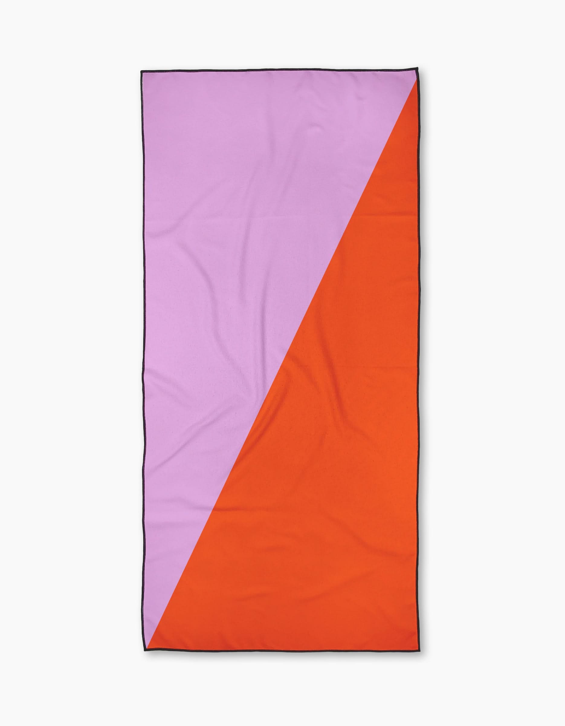 The Geometry Bold Horizon is a rectangular, quick-drying towel with a diagonal split: light purple in the top left, orange in the bottom right, thin black border, slightly wrinkled look—perfect as a compact beach towel.