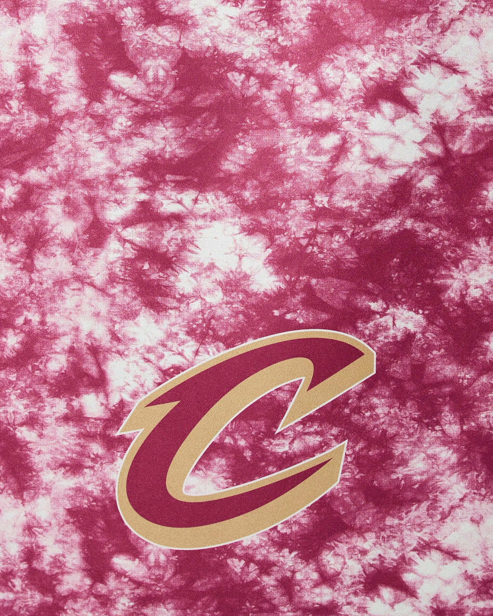 Geometry’s “Cavaliers Flash” features maroon and white tie-dye fabric with a bold gold and maroon “C” logo, outlined in white for the Cleveland Cavaliers.