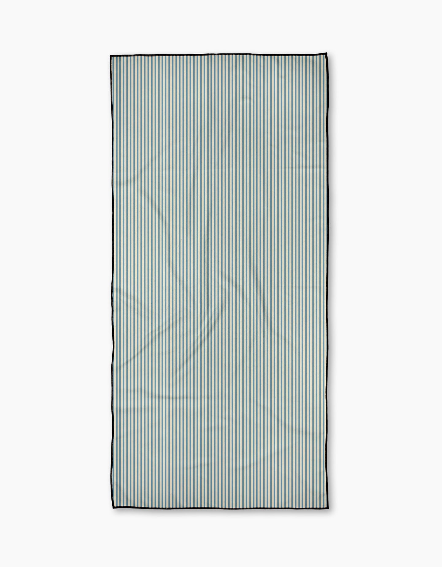 The Clean Slate beach towel by Susan Heid is rectangular and quick-drying, featuring thin, evenly spaced vertical blue and white stripes with a dark border, shown on a plain white background.