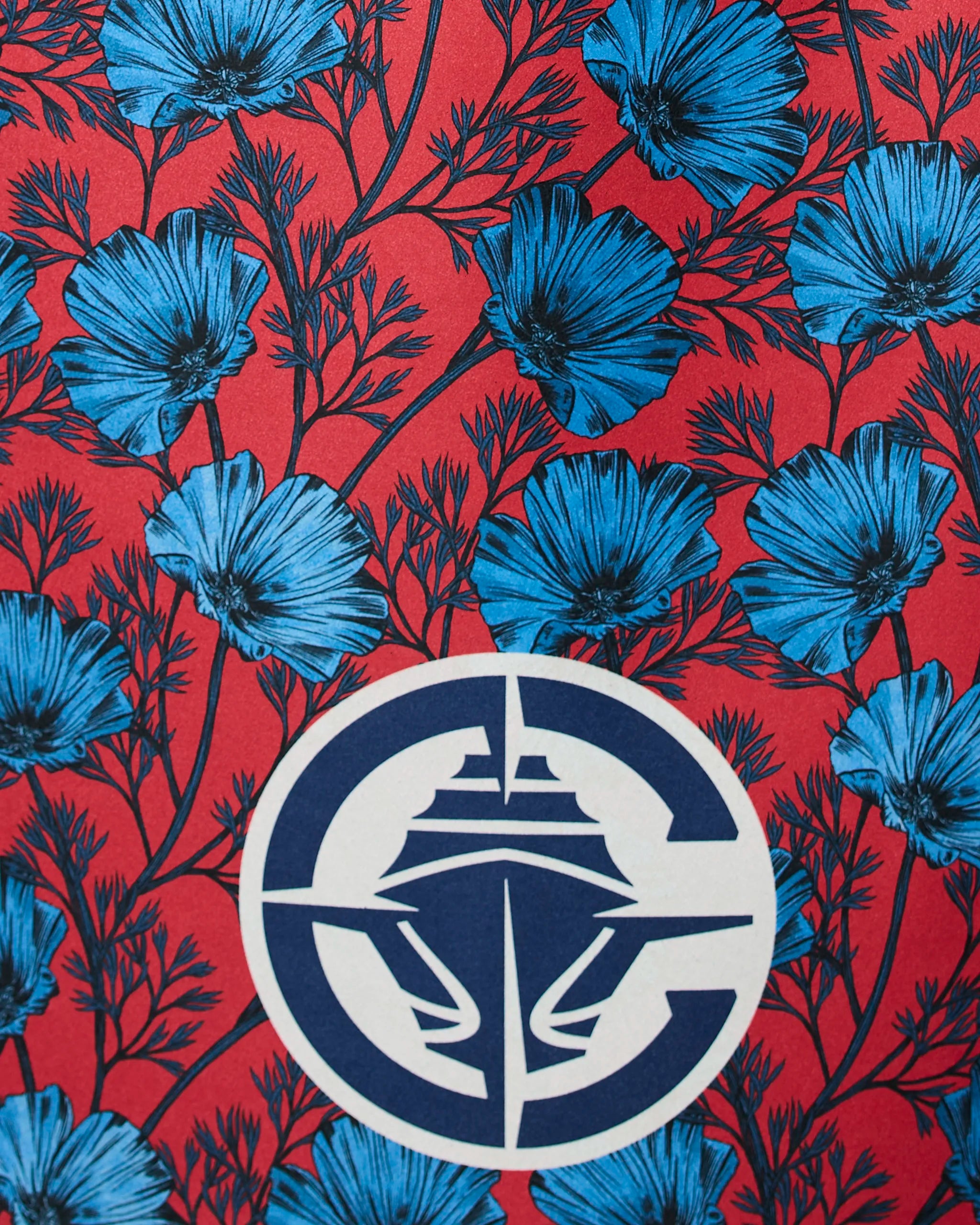 The Clippers Floral design by Geometry features a bold blue and white cruise ship logo centered on a vivid red background with blue flowers and intricate black stems.
