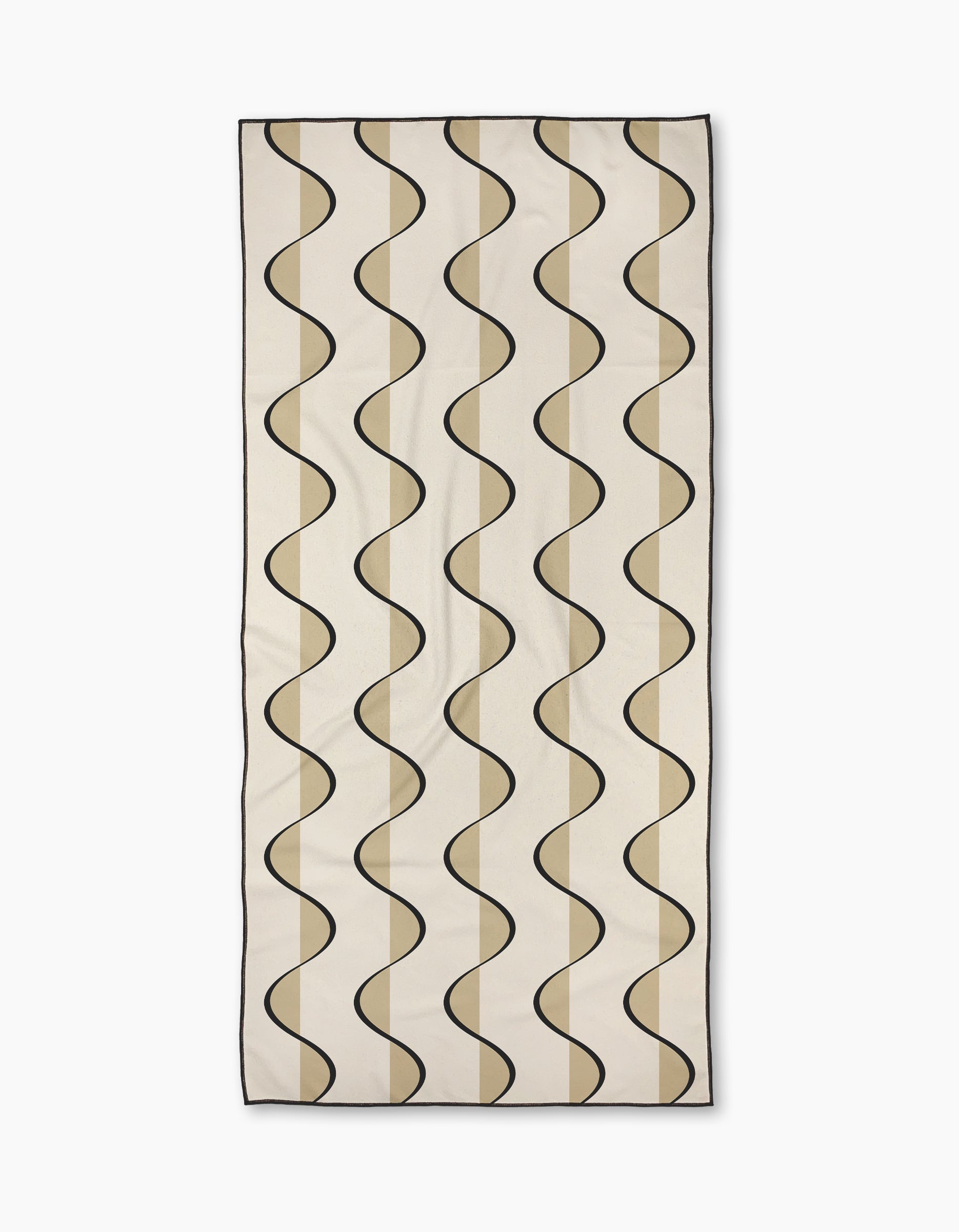 Desert Drift by Geometry: a rectangular beige, ultra-absorbent towel with evenly spaced wavy black lines and tan shapes in a repeating pattern.