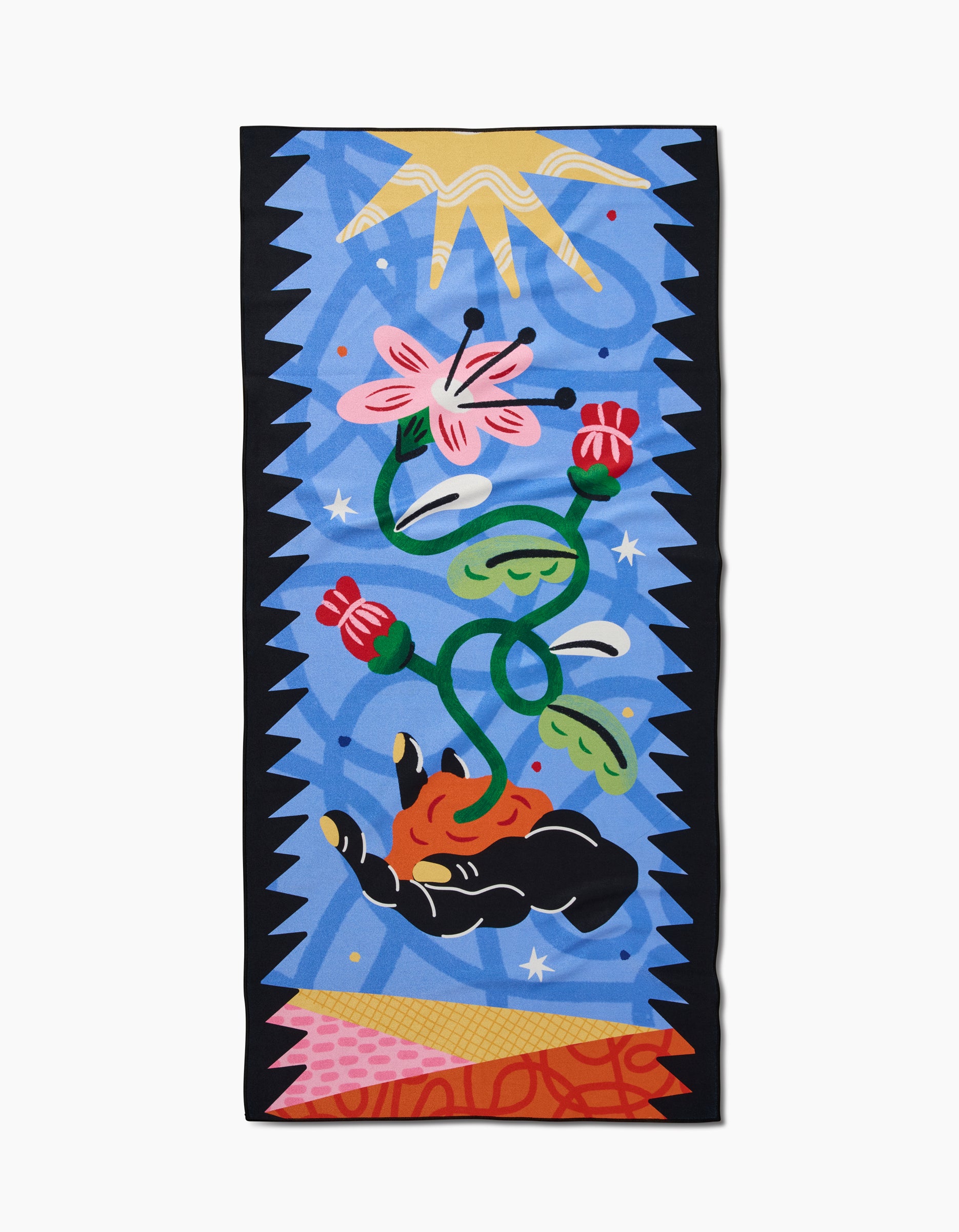 A vibrant illustration from Camila Leãos Earth shows a hand with whimsical red flowers and green stems against blue shapes and a yellow sun—a perfect motif for an ultra-absorbent towel.