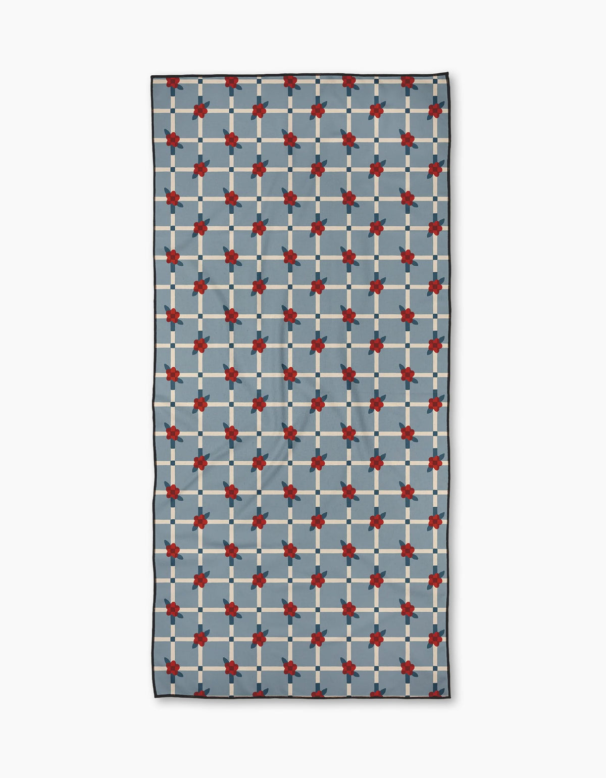 The Geometry Floral Parade Grid is a rectangular quick-drying beach towel with red floral motifs at the grid intersections on a blue and gray checkered background, shown laid flat on a white surface.