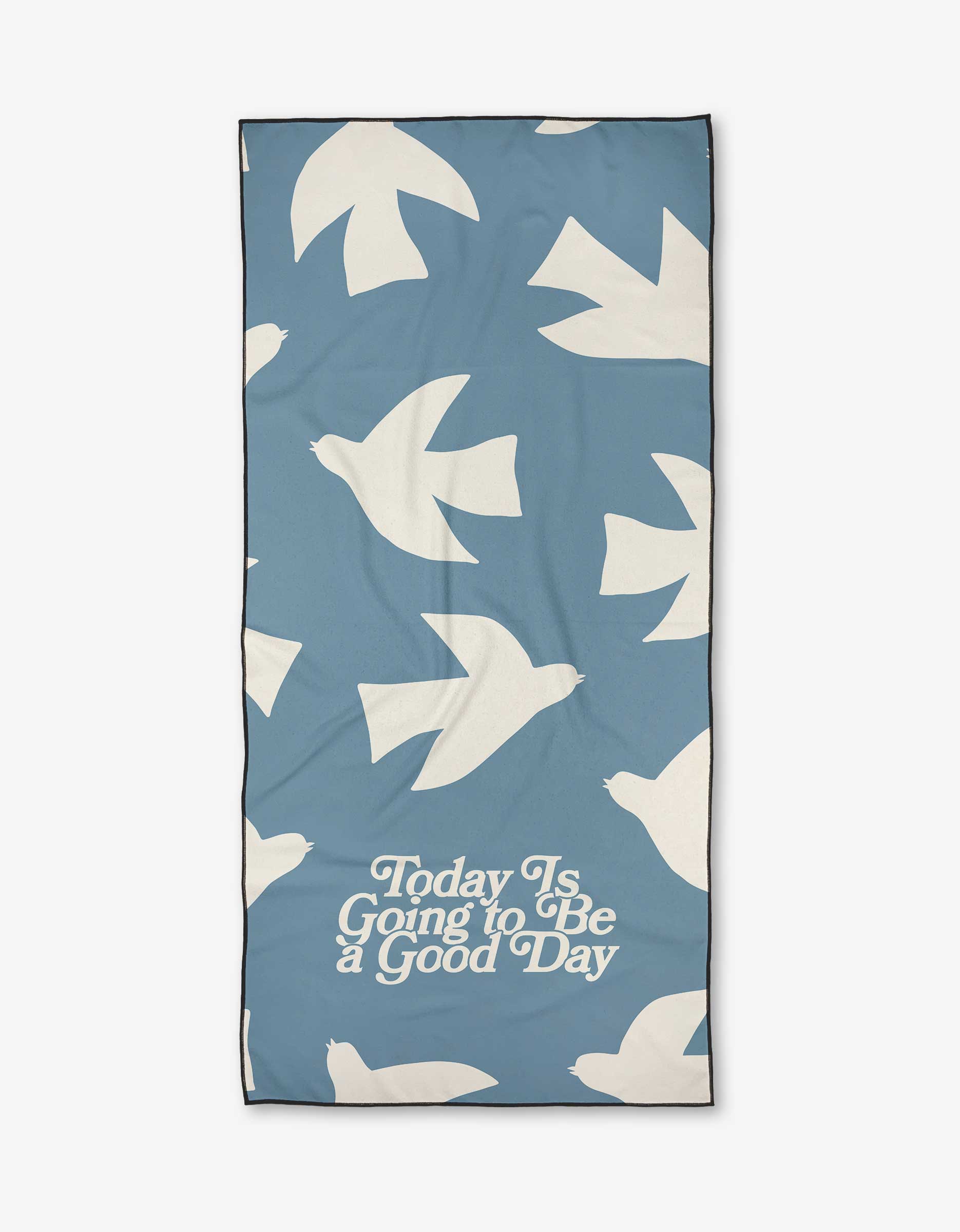 The Good Day beach towel by Quotes by Christie is blue, made from recycled materials, and features white bird silhouettes with “Today Is Going to Be a Good Day” in cursive at the bottom.