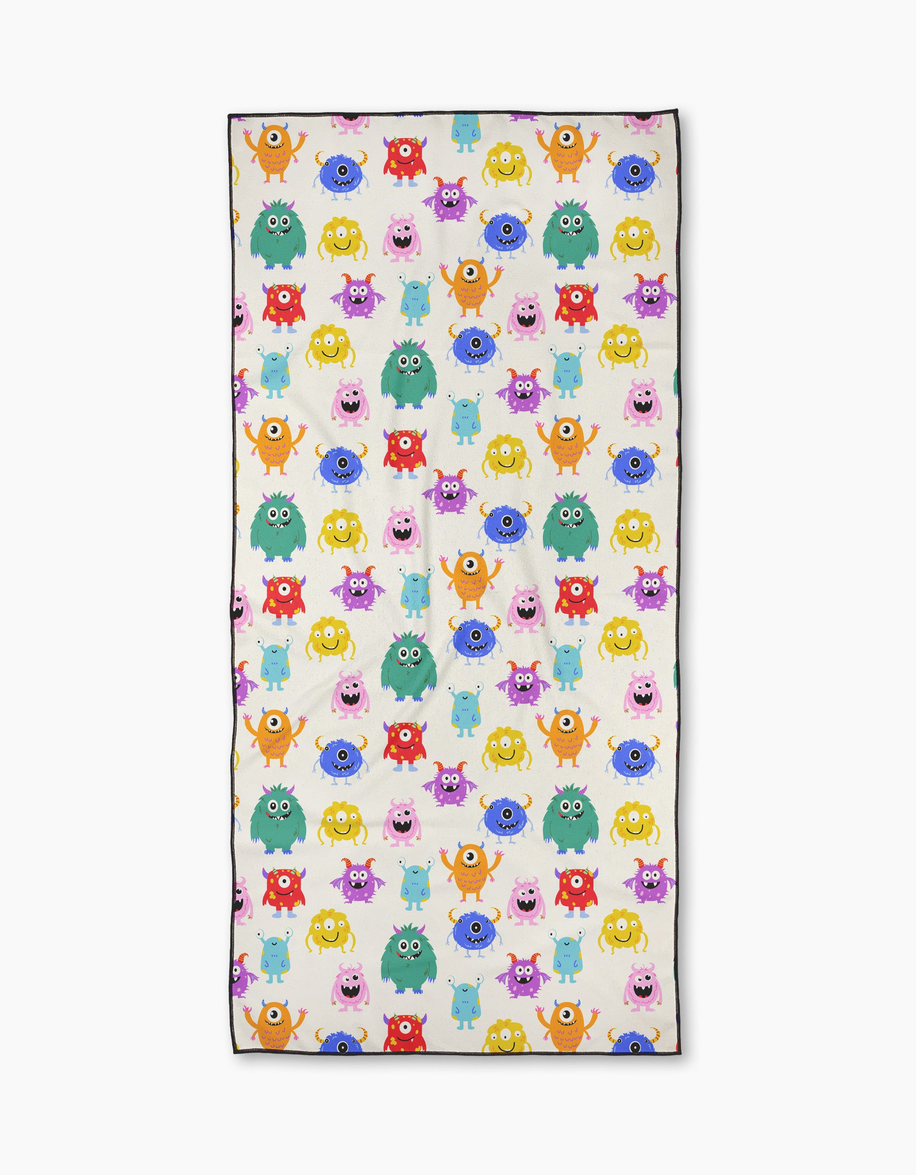 Goofy Critters by Vaishali Design Studio is a rectangular micro-loop beach towel with a playful pattern of colorful cartoon monsters—pink, yellow, green, blue, and orange—of various shapes and expressions on a white background.