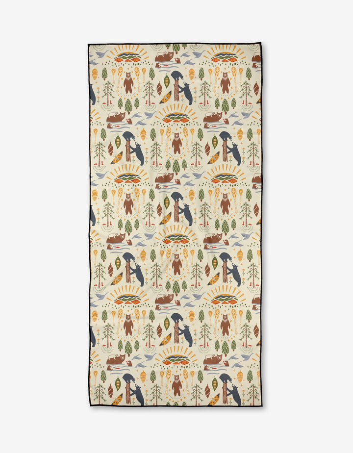 The Mama Bear Micro-loop Beach Towel by Elisabeth Wing features playful bears, trees, canoes, fish, and suns on a cream background. This quick-drying rectangular towel is crafted from recycled materials and has an outdoorsy camping theme.