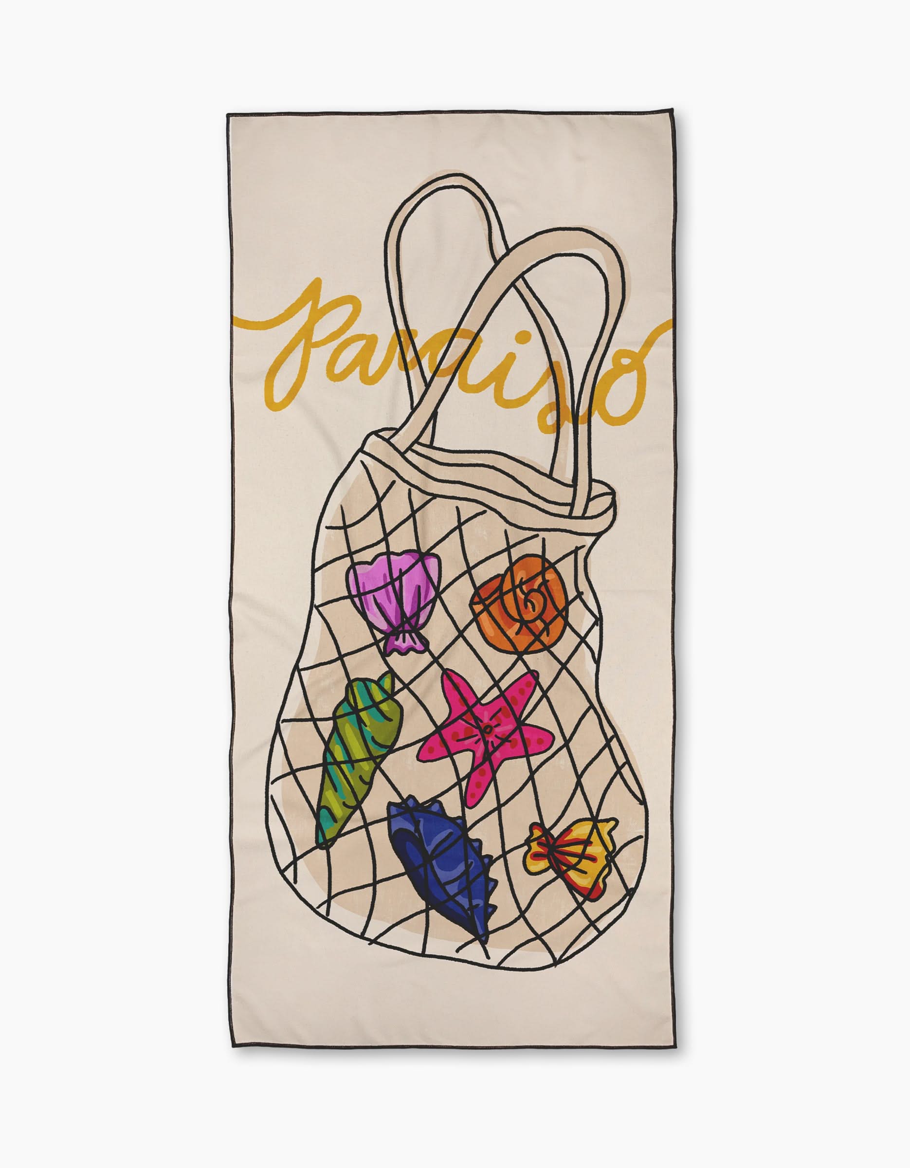 The Paraiso beach towel by Geometry features a black netted bag illustration filled with colorful seashells and a starfish. Made from quick-drying, recycled materials, it’s finished with “Paraiso” in sunny yellow cursive above the bag.