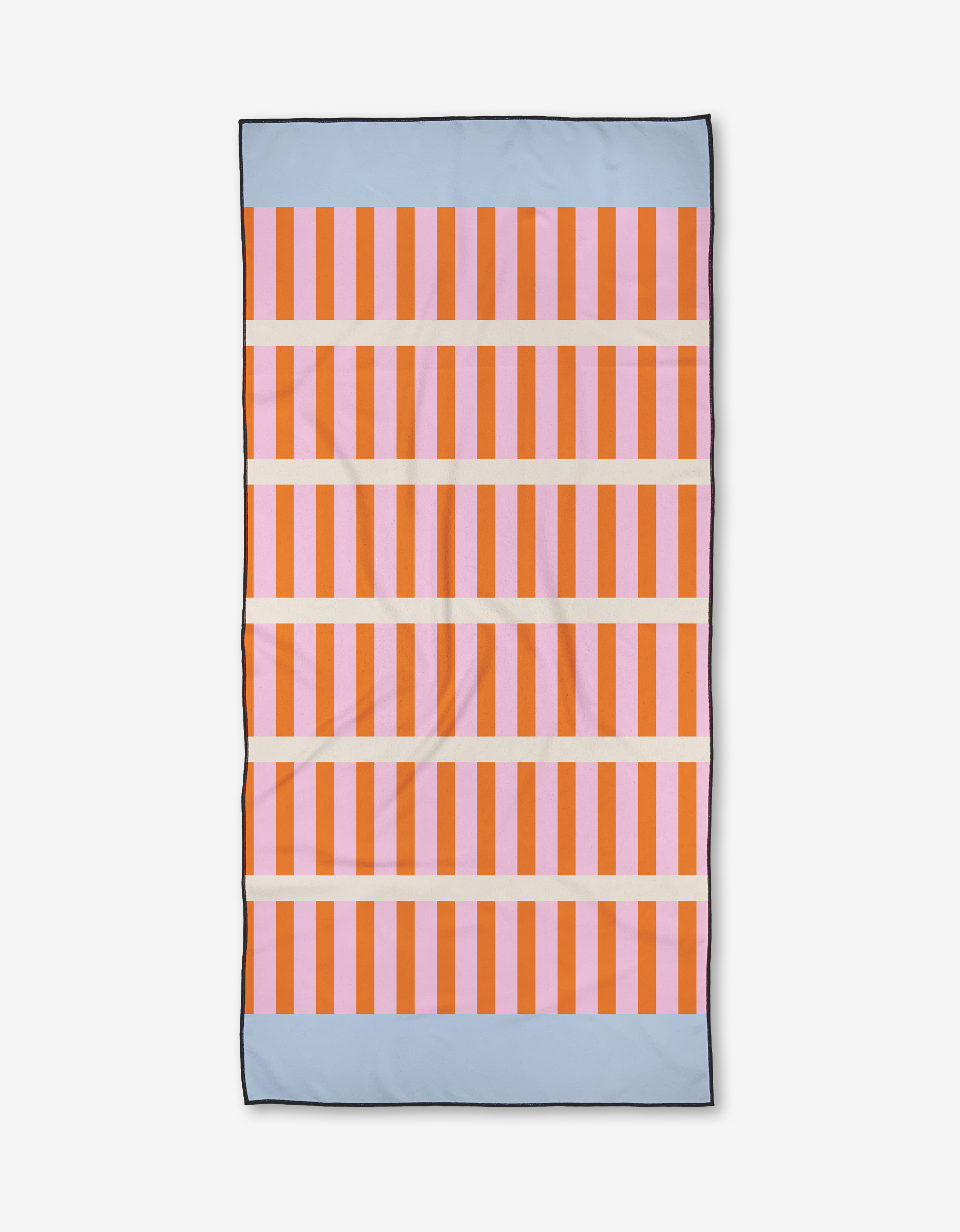 The Red Glow towel by Happy Hemera is a quick-drying beach towel with vertical orange and pink stripes, horizontal blue bands at the top and bottom, and three thin cream stripes crossing the center.