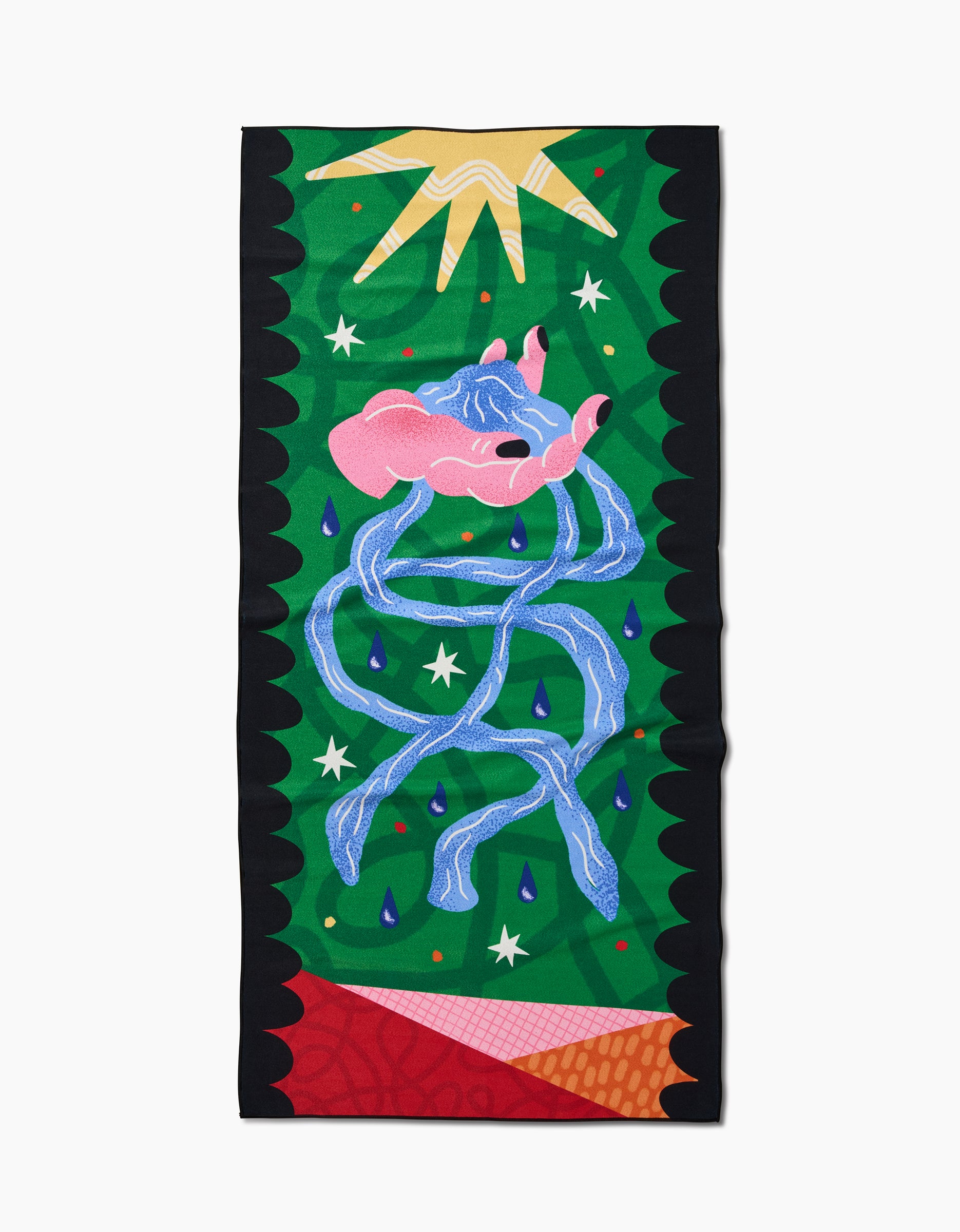 The Water Beach Towel by Camila Leão, made from recycled materials, shows a blue snake around a pink hand with stars, water droplets, and abstract shapes on green with jagged black edges and a yellow sunburst.