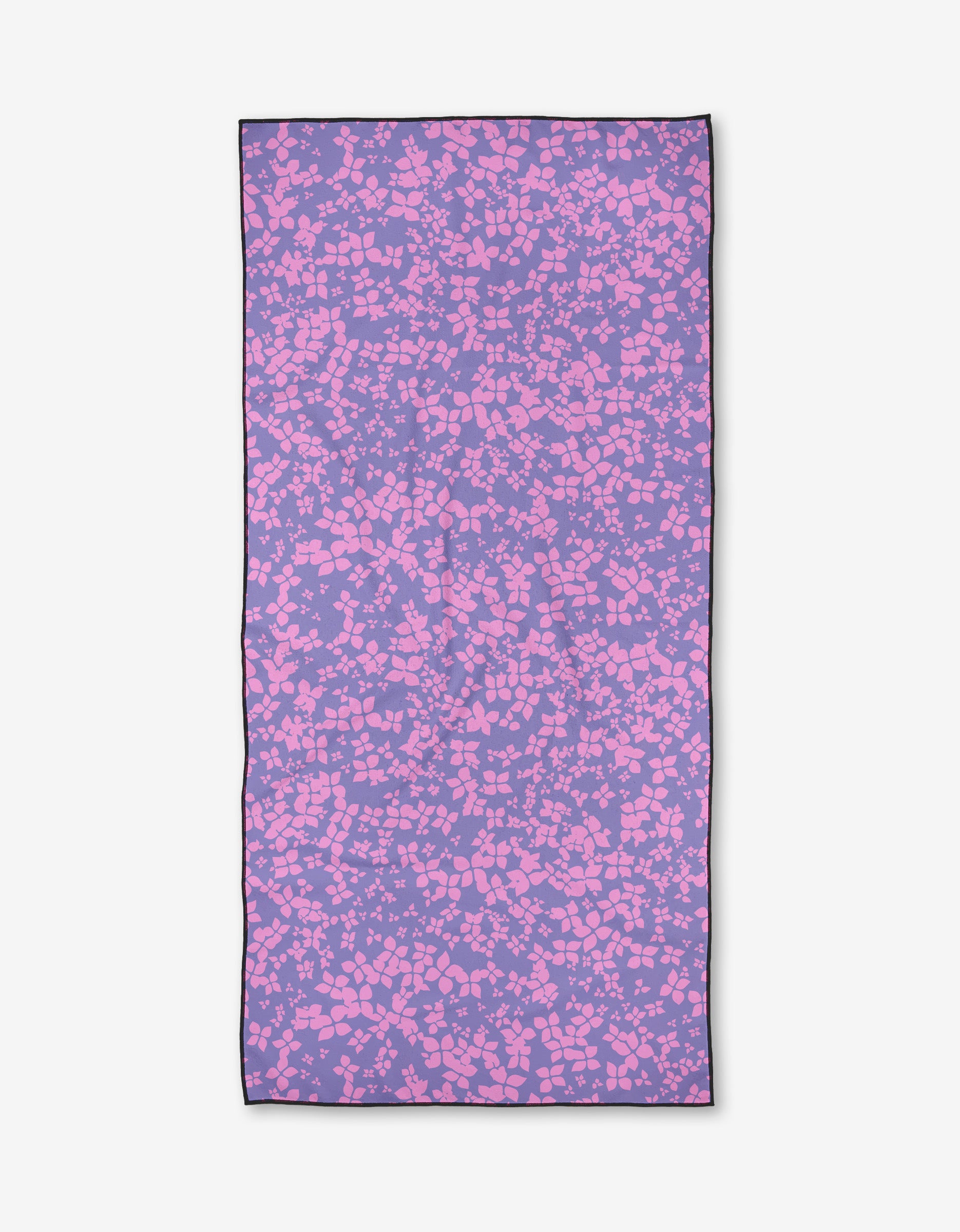 The Sareka Unique You Give Me Butterflies towel is a rectangular, quick-drying beach towel with a purple background and abstract pink shapes like pebbles or confetti, all outlined by a thin black border.
