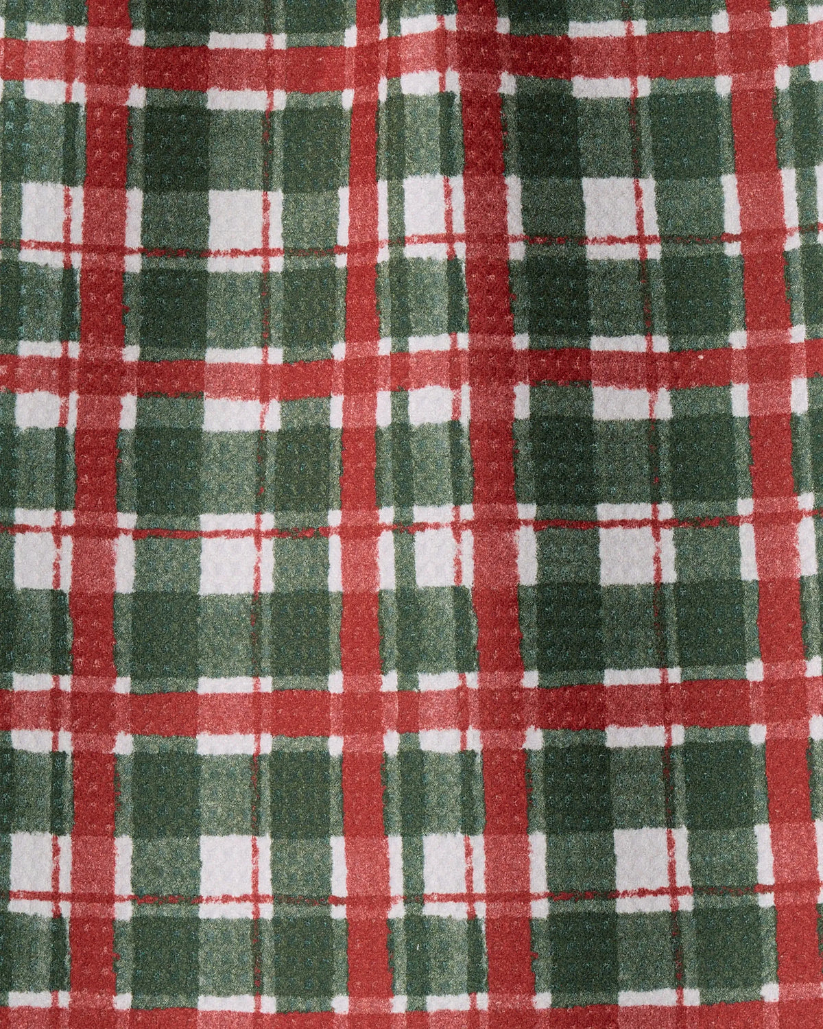 Introducing Alpine Plaid by Geometry—a green, red, and white mini towel featuring a festive and traditional checkered design with intersecting horizontal and vertical lines, expertly crafted from Geoweave fabric made using recycled materials.