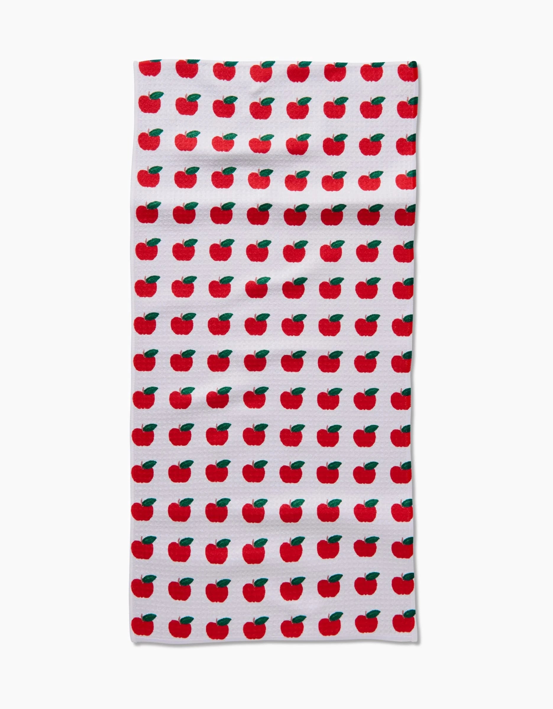 The Apple Grove Bar Towel by Brittany Jepsen features a repeating red apple with green leaf pattern on white Geoweave fabric, known for its ultra-absorbency and even design coverage.