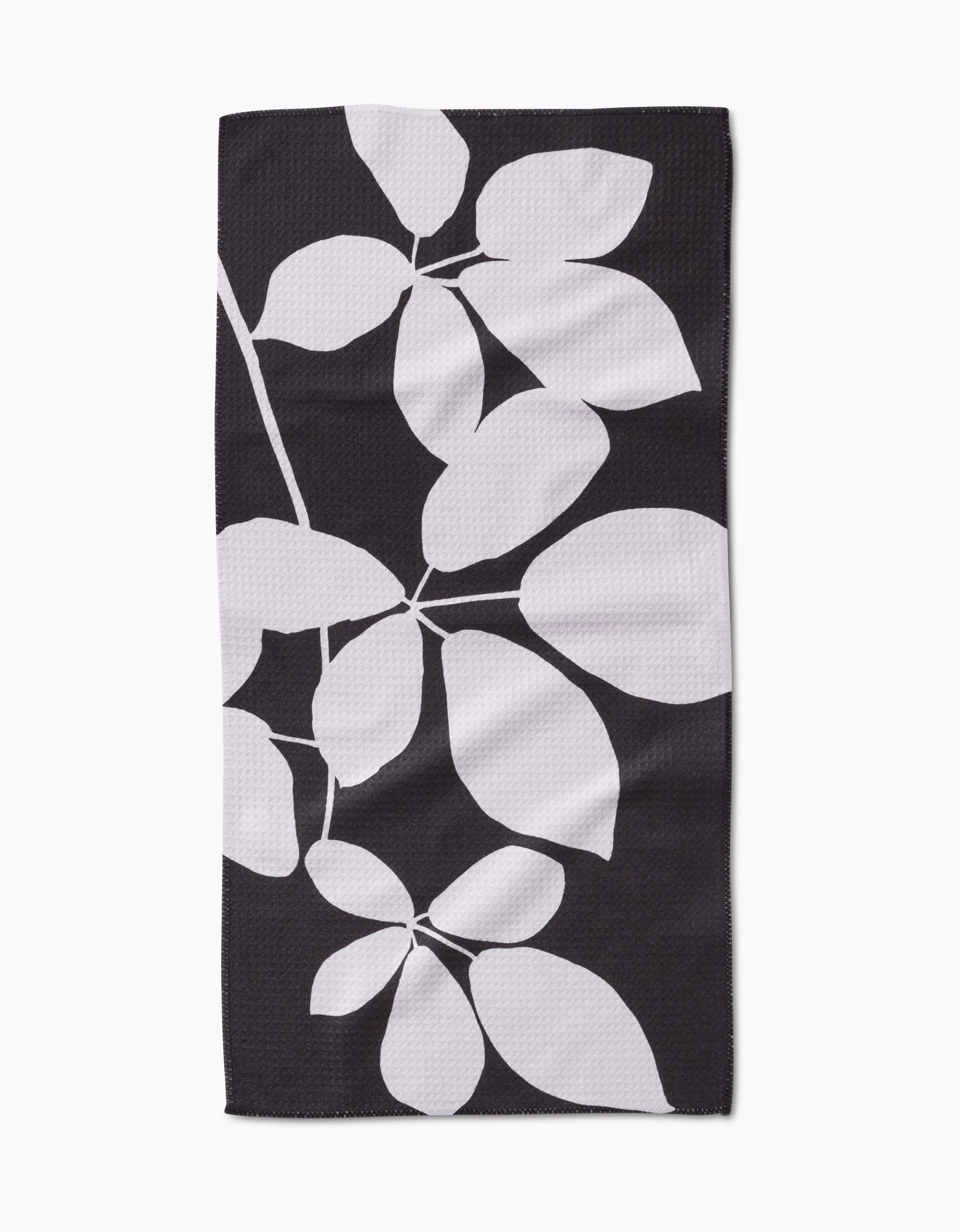 PrintedPlant’s Blackberry is a rectangular black bar towel with a striking white botanical leaf design, crafted from premium Geoweave fabric.