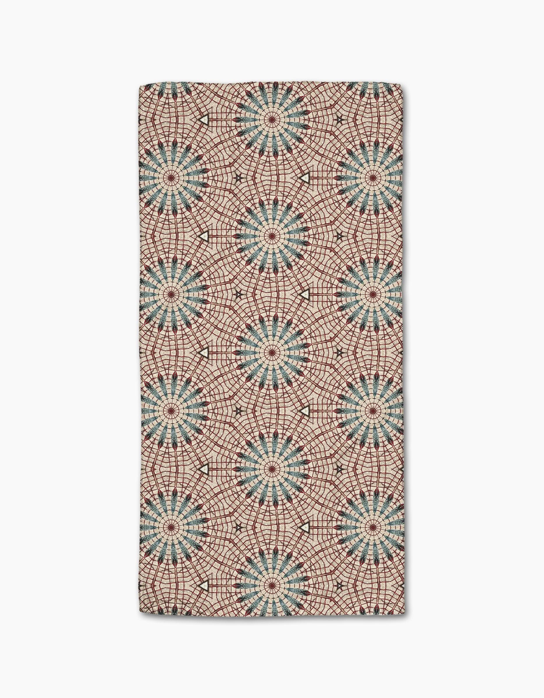 The Katherine Berkeley Blue Aster Foxtrot Bar Towel features ultra-absorbent Geoweave fabric and a kaleidoscopic pattern of blue and red starbursts on beige for a bold, symmetrical look.
