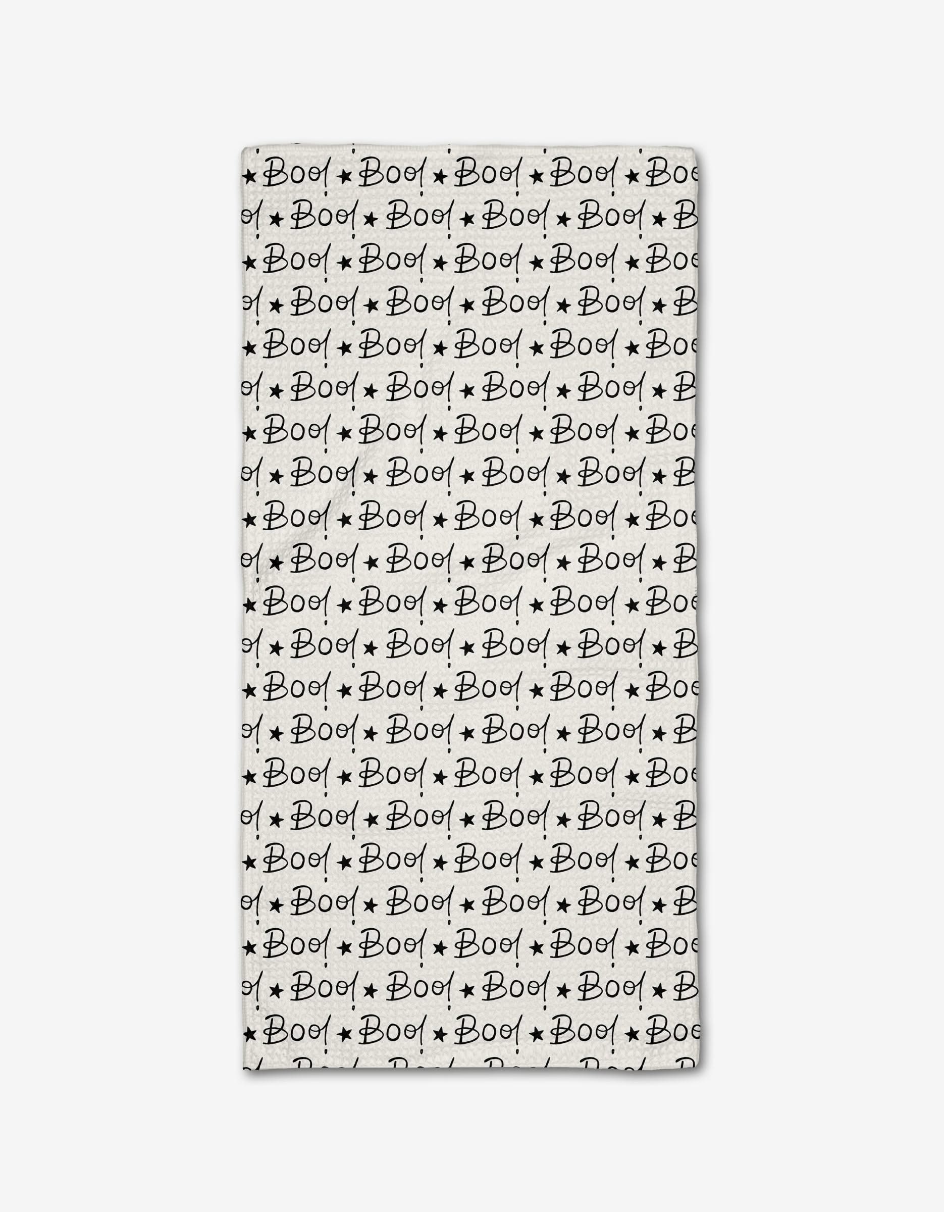 The Boo to You Bar Towel by Hufton Studio is a rectangular white towel made from recycled materials, featuring a repeating black “Boo!” text pattern with small stars for a playful, spooky Halloween design.
