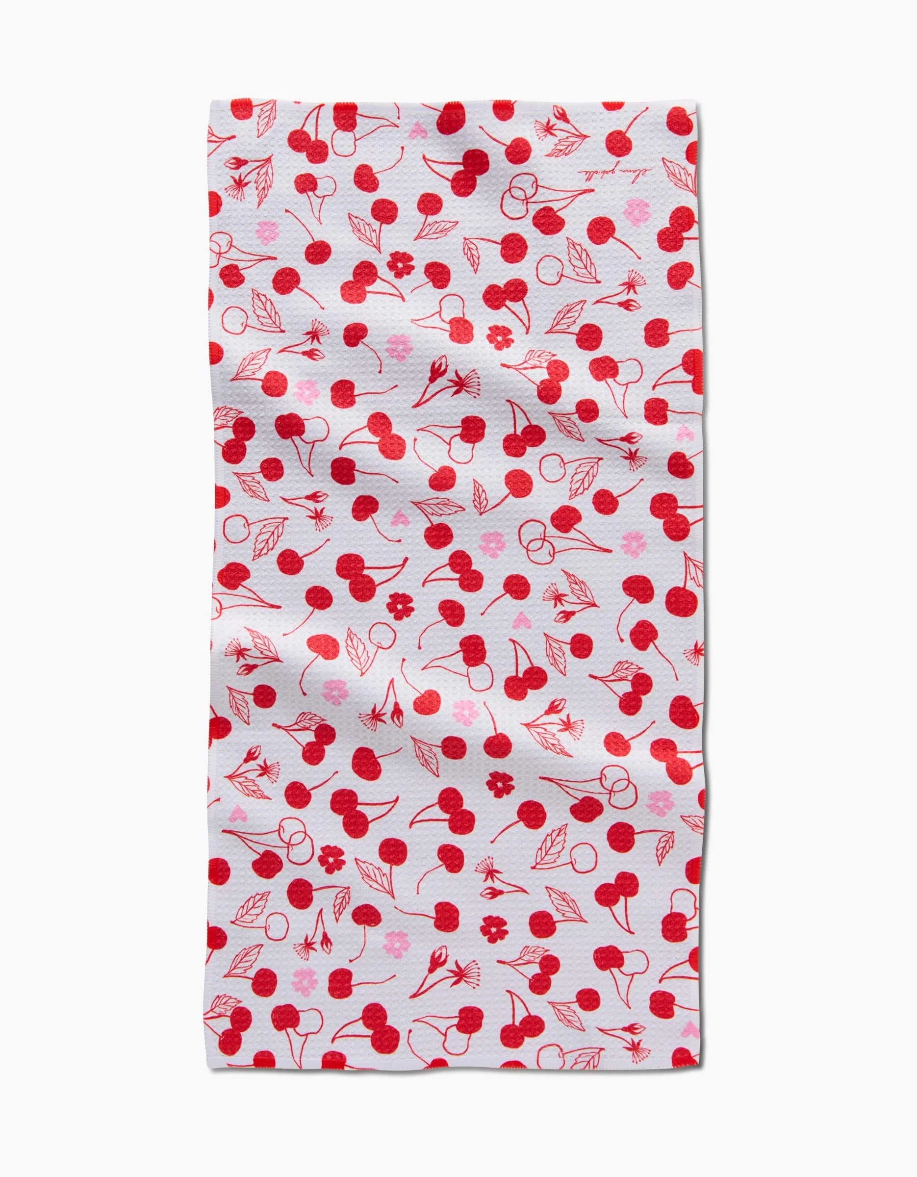 The Cute Cherry bar towel by Elana Gabrielle features a playful pattern of red cherries, small red flowers, and leaves on white, and is crafted from recycled materials.