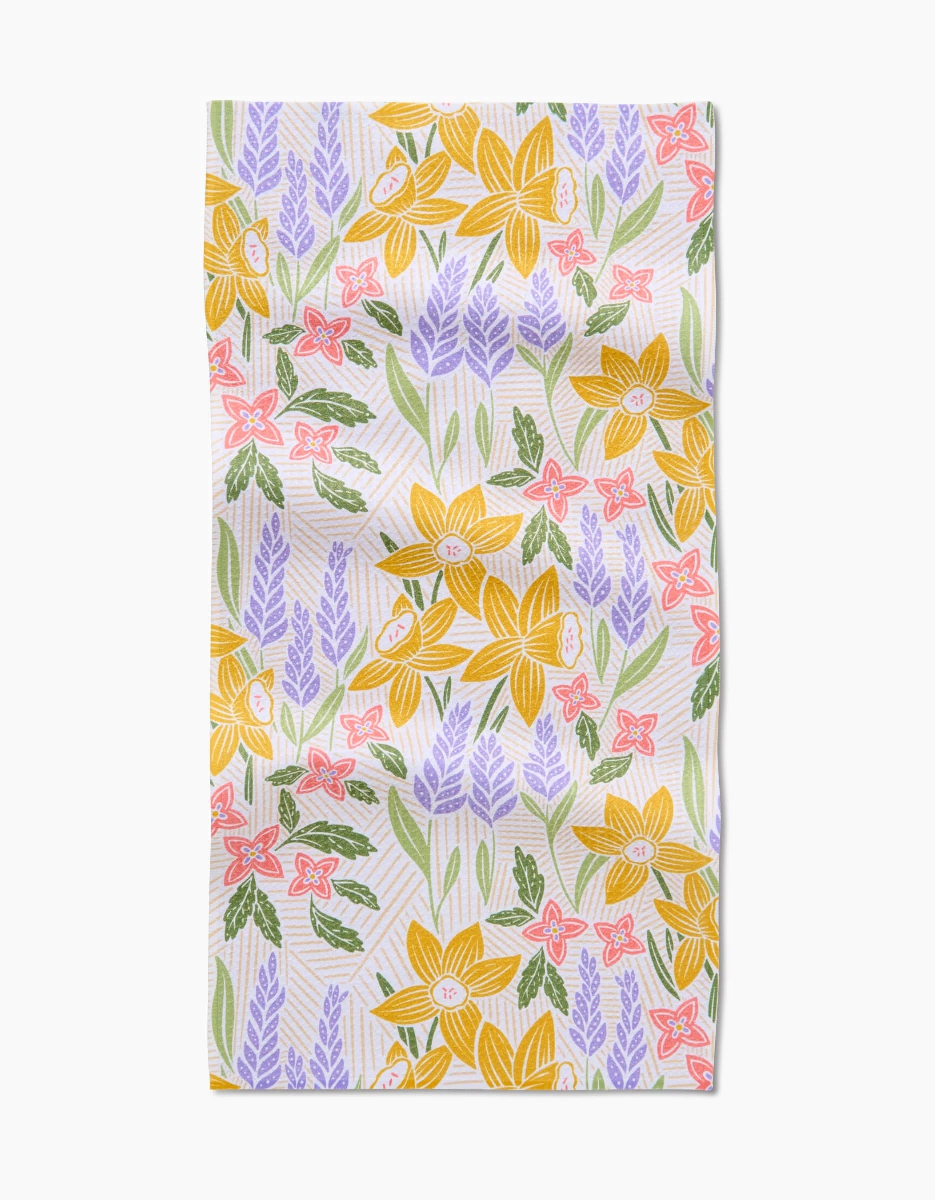 Daffodil Dreams by Sarah Daugherty: a rectangular bar towel featuring yellow daffodils, purple lavender, pink flowers, and green leaves on white Geoweave fabric for superior absorbency.