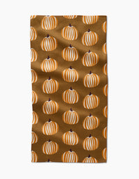 The Dancing Pumpkins bar towel by Lizzie Clark features a brown Geoweave fabric with neat rows of white and orange striped pumpkins with dark stems.