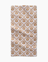 The Dancing Vines kitchen towel by Charlie Rowan Designs is a rectangular white recycled towel with a brown floral and leaf diamond pattern. Its symmetrical design brings charm and function to this ultra-absorbent kitchen essential.