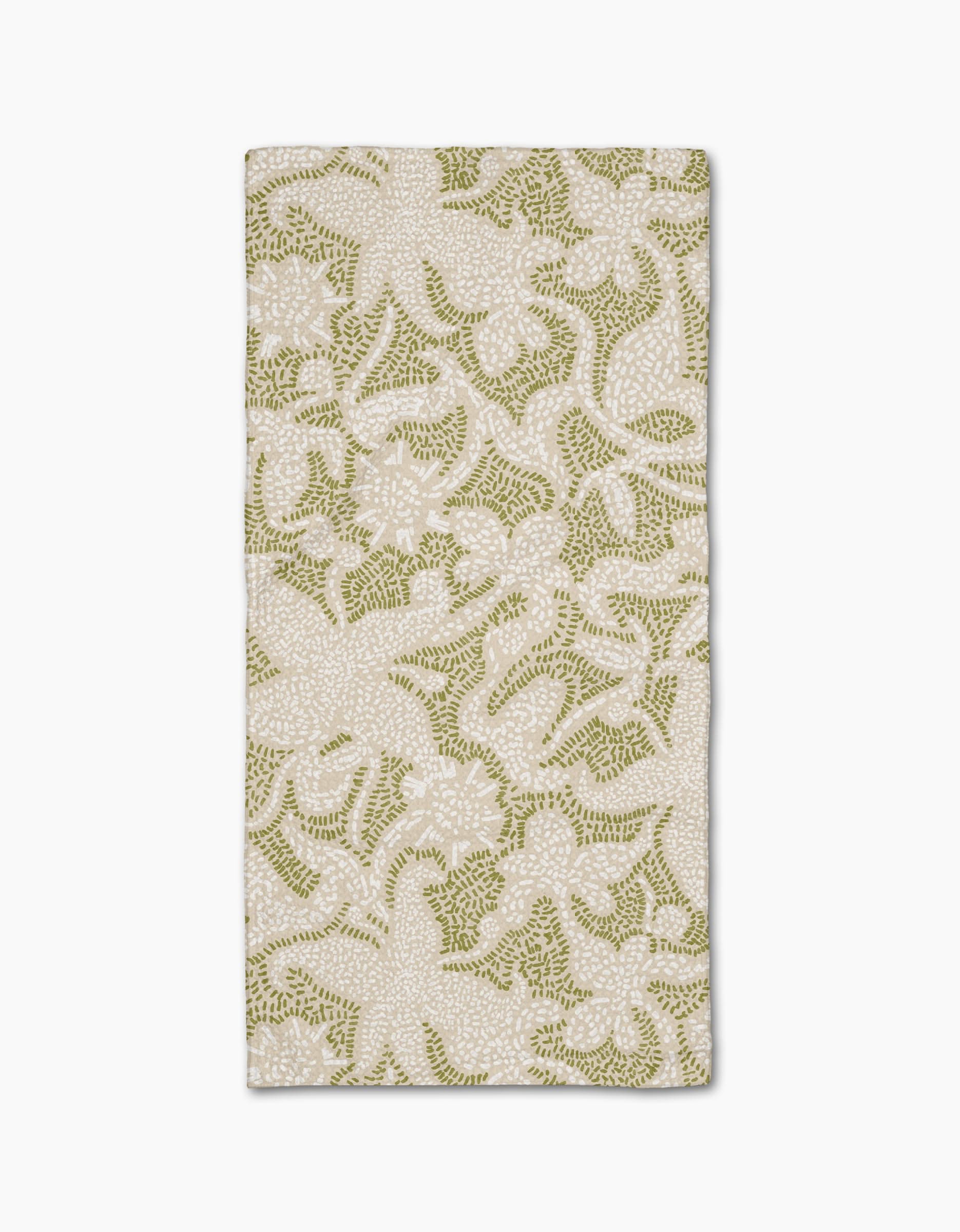The Geometry Dotted Floral Garden napkin features ultra-absorbent Geoweave fabric with a stylish green and white floral pattern on a light background, perfect for enhancing any table setting.