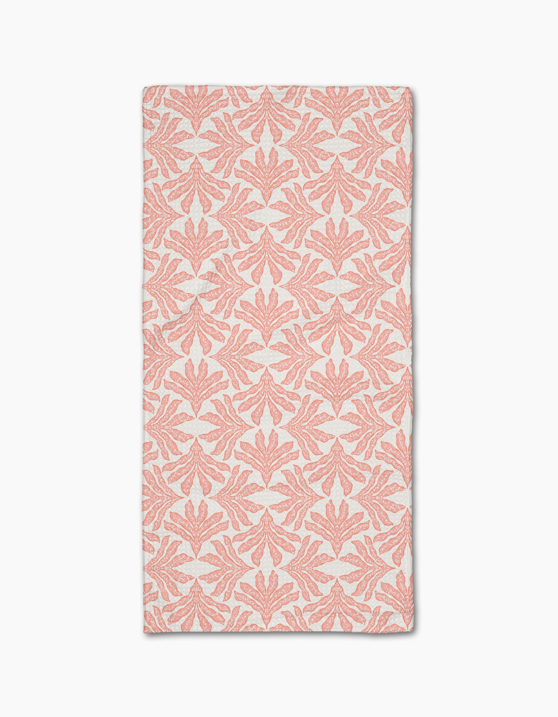 The Ethereal Seaweeds in Blush by Jasmine Blooms Designs is a rectangular white cloth with coral pink, symmetrical seaweed motifs made from recycled materials for a classic, elegant look. Shown flat against a white background.