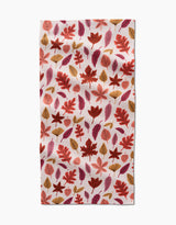 The Kayla Ann Fall Leaves Bar Towel features Geoweave fabric and a pattern of red, orange, and brown autumn leaves on white, creating a festive seasonal look.